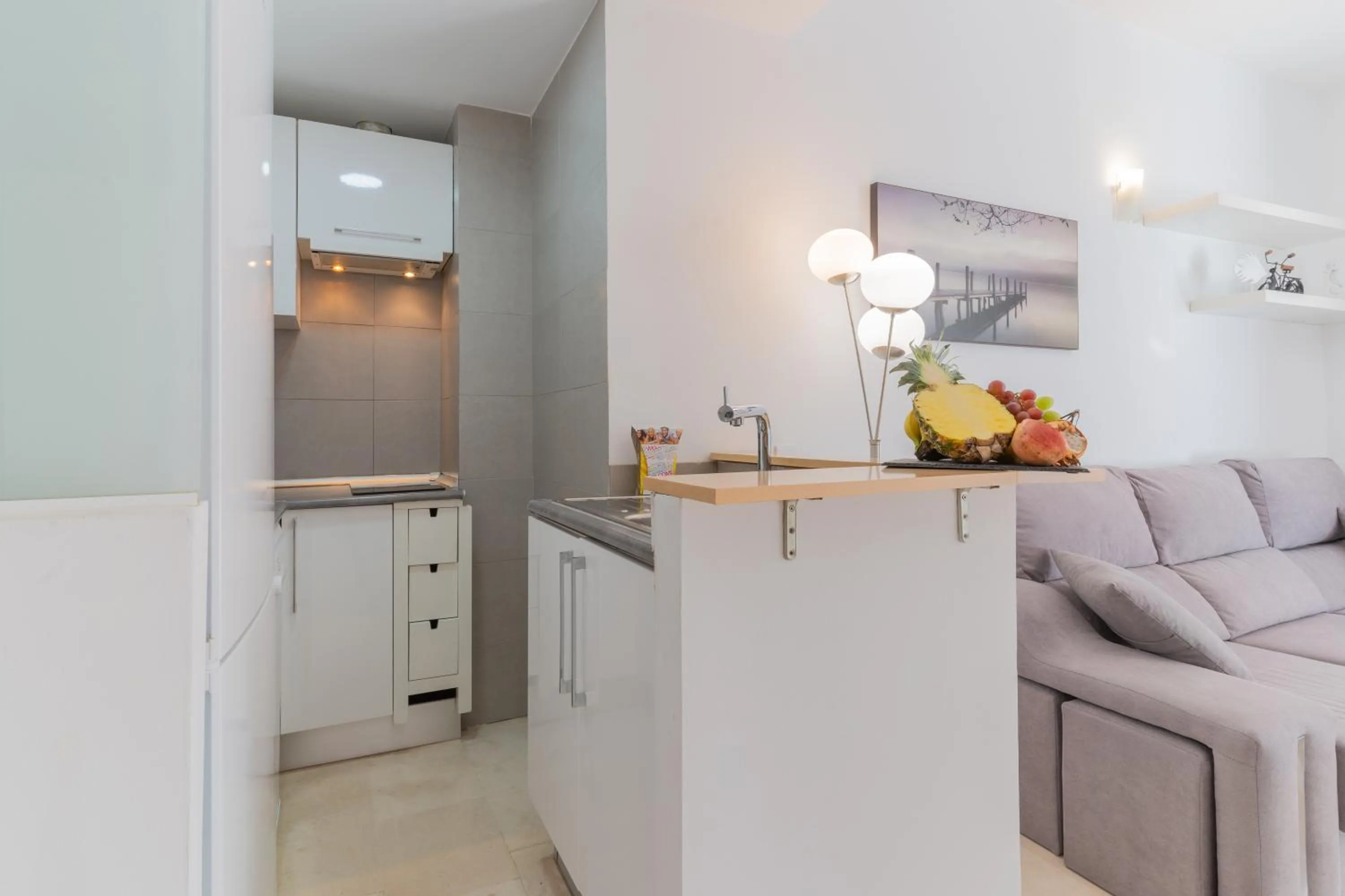 Kitchen or kitchenette in Apartamentos Castillo by Sur Suites