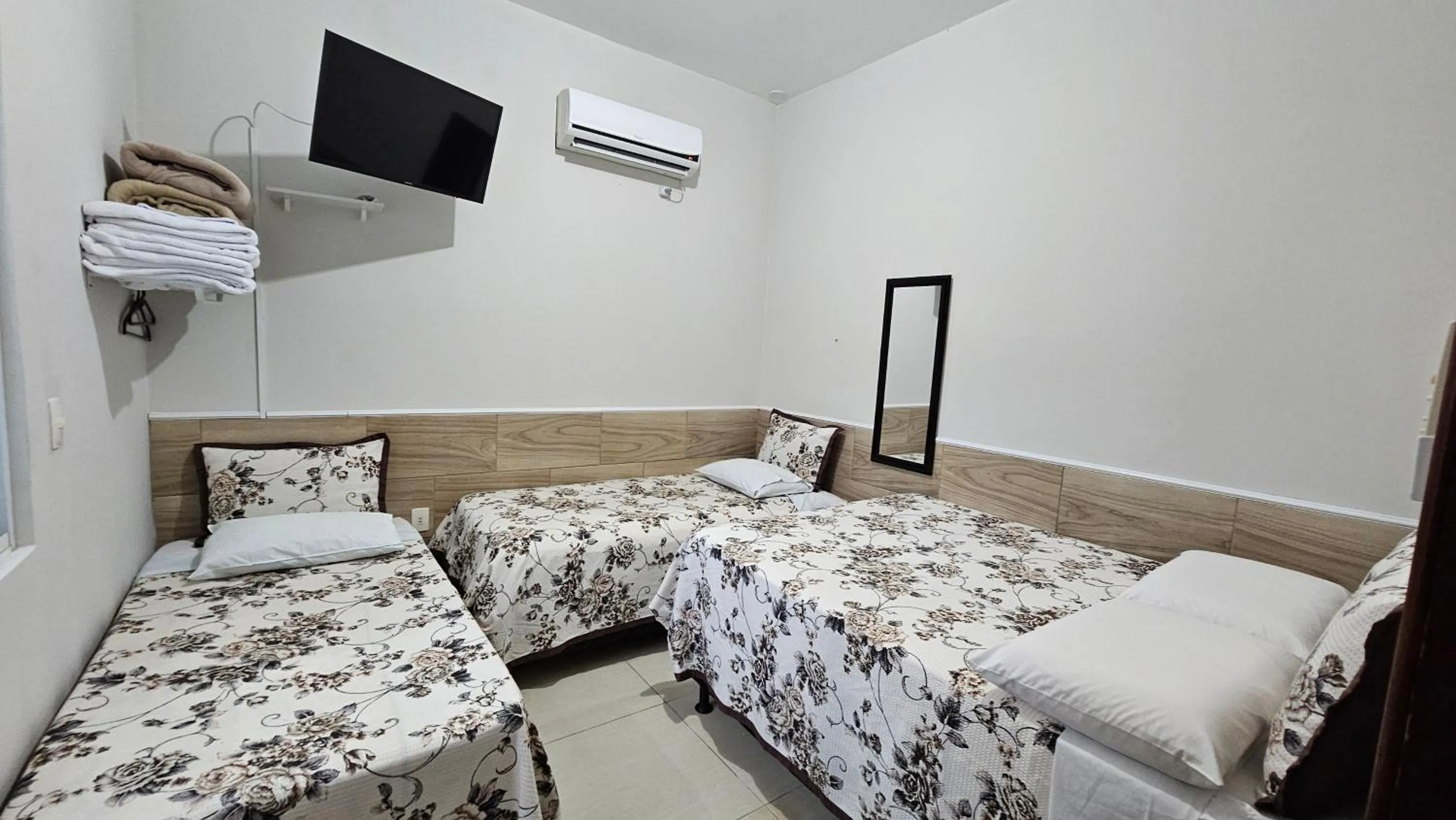 Bed in Pousada Marques Floripa
