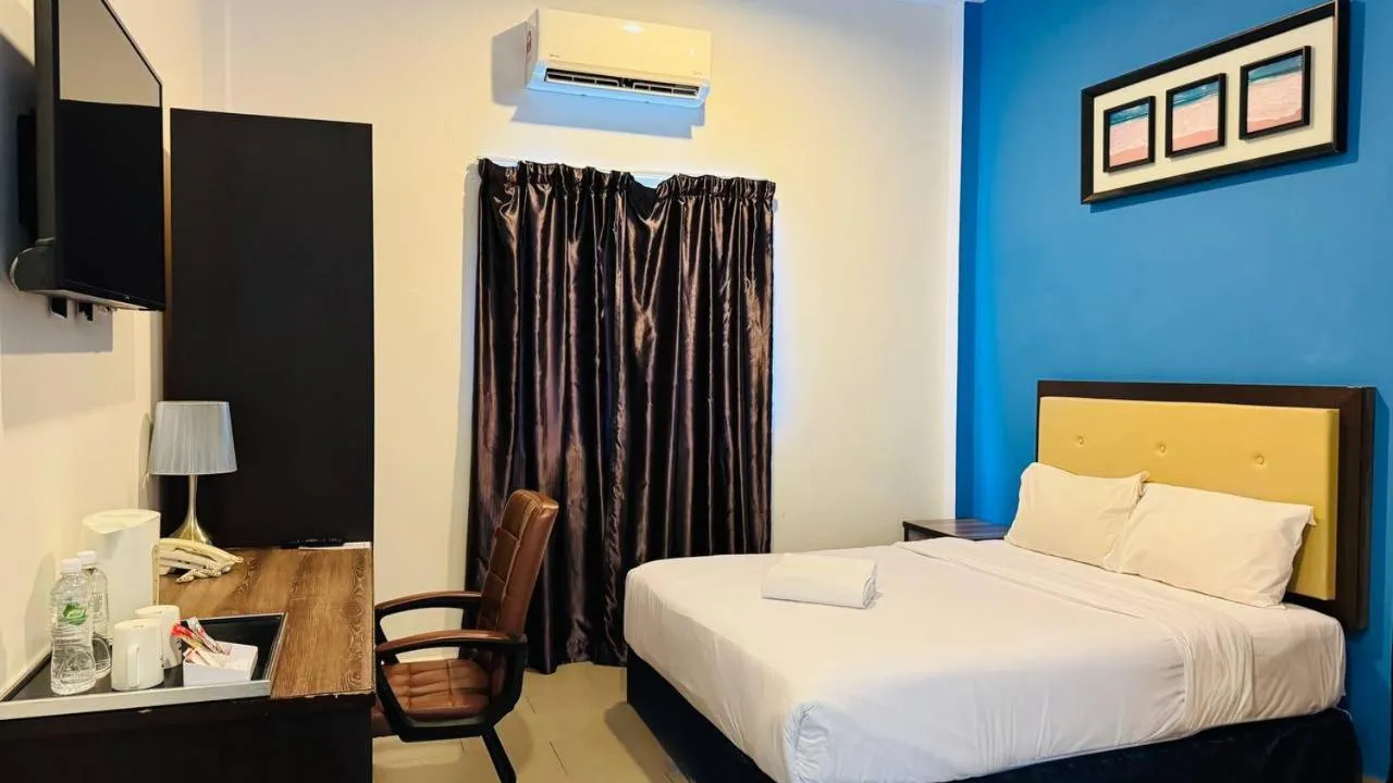 Bed in Royal Agate Beach Resort