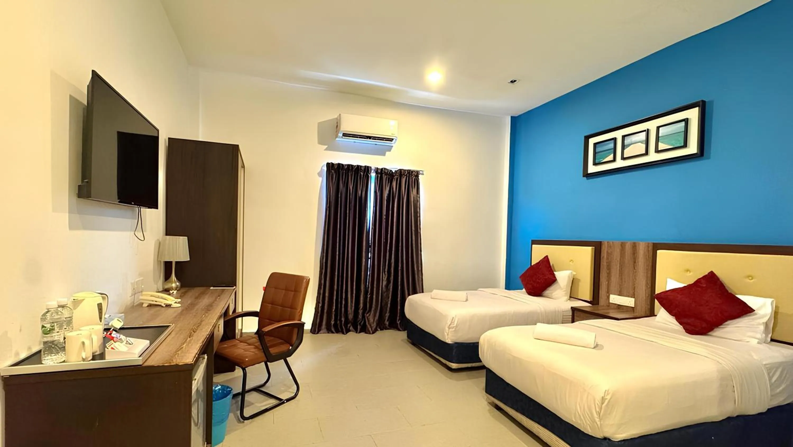 Bed in Royal Agate Beach Resort