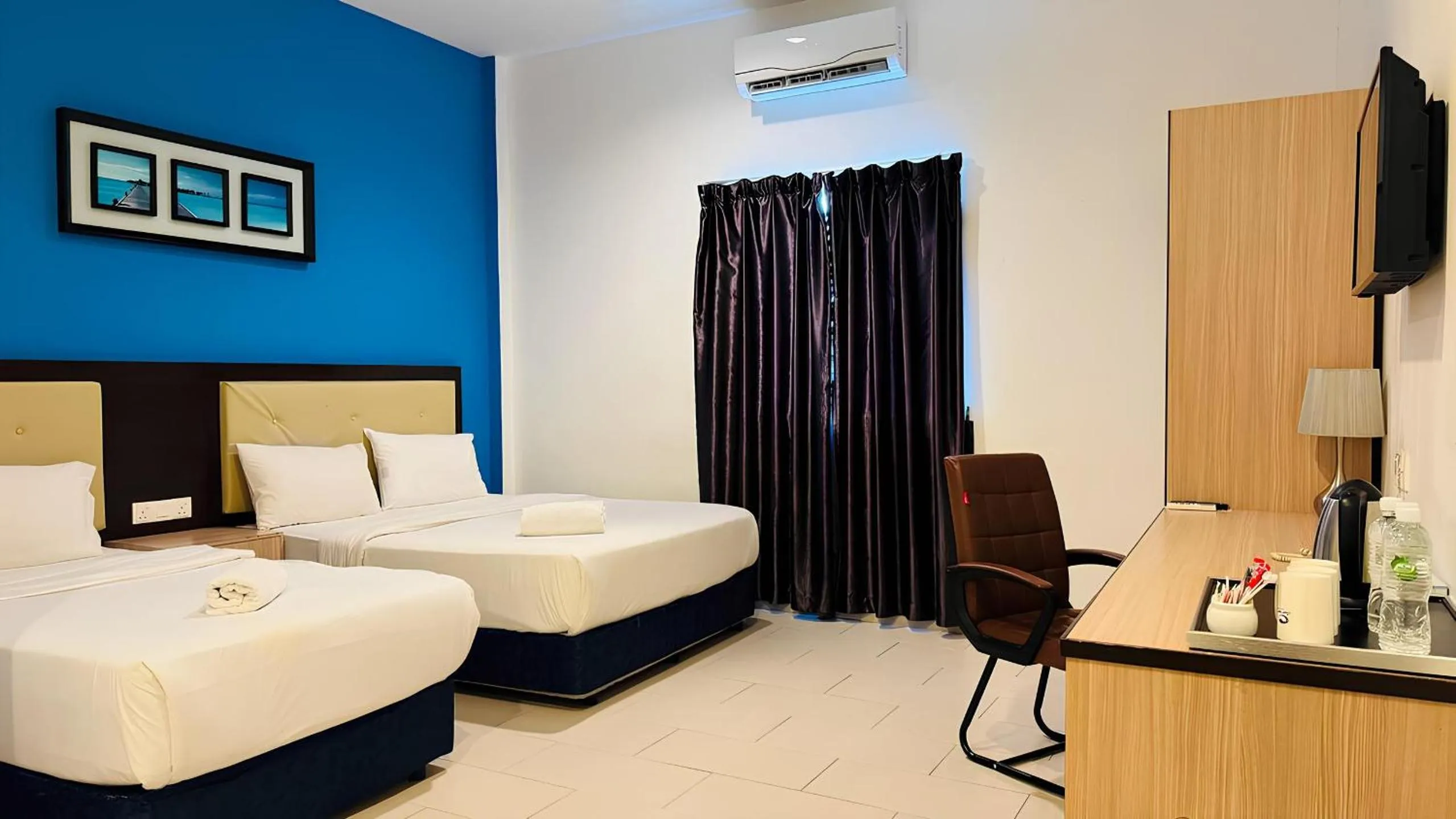 Bed in Royal Agate Beach Resort