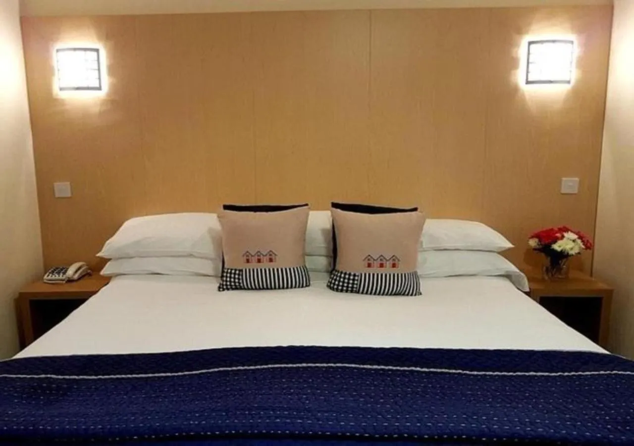 Bed in Heights Hotel
