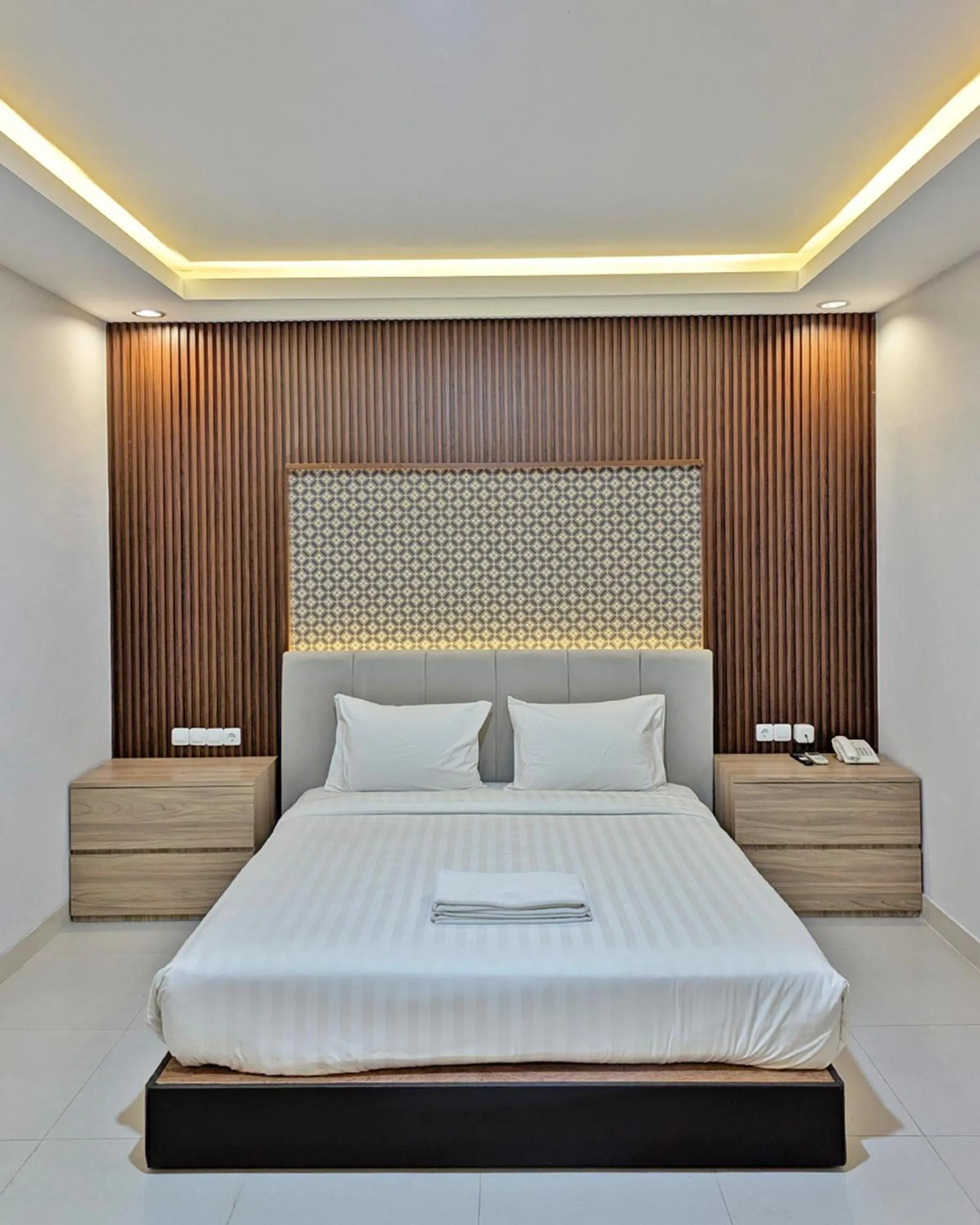 Bed in The Amrta Borobudur