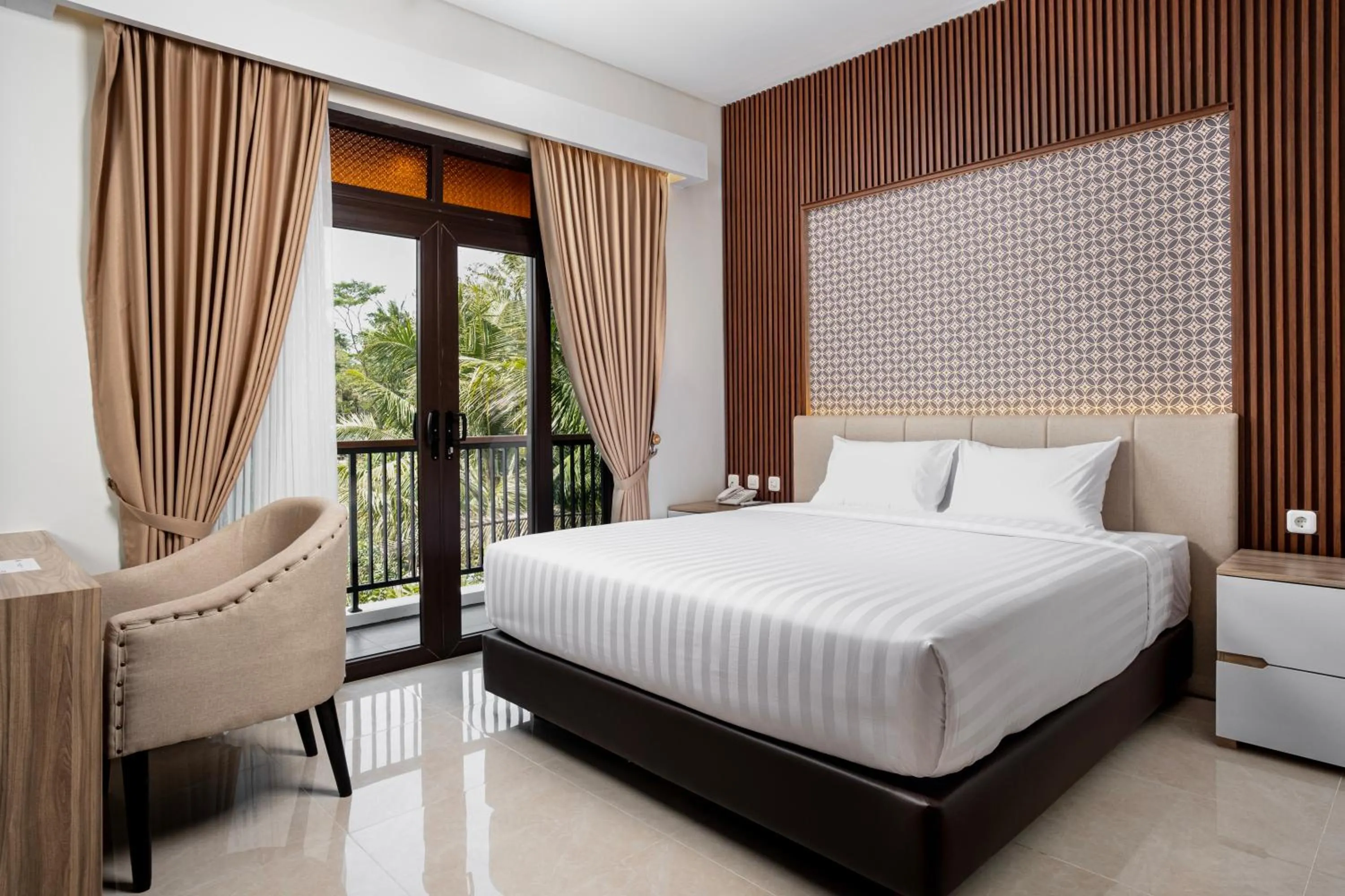 Bed in The Amrta Borobudur