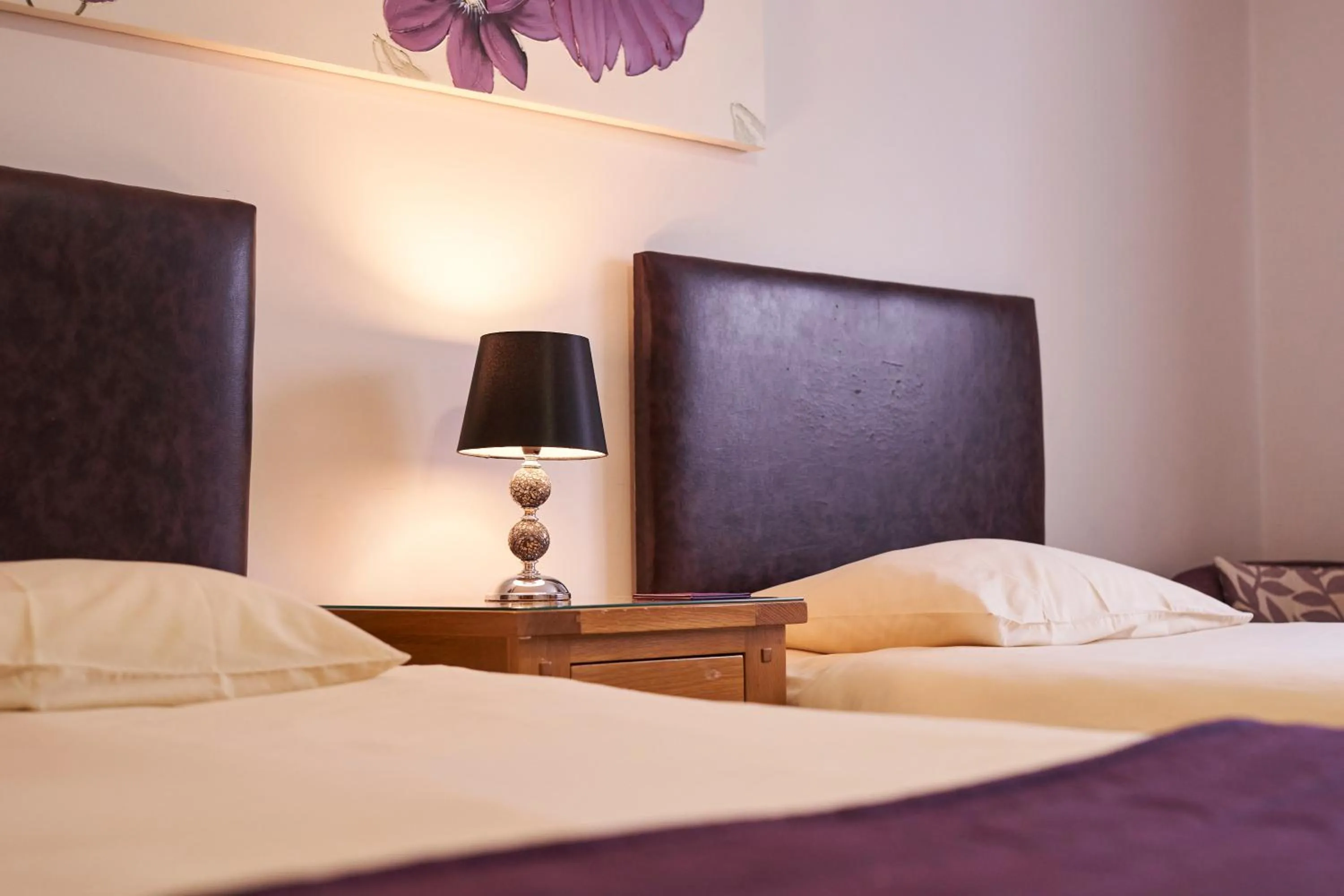 Bed in The New Inn Hotel