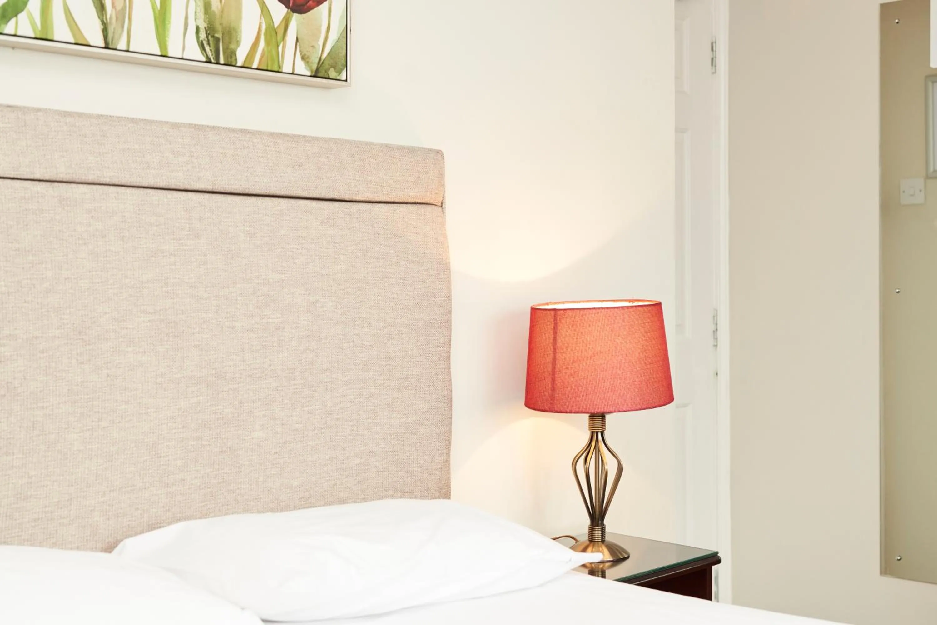 Bed in The New Inn Hotel