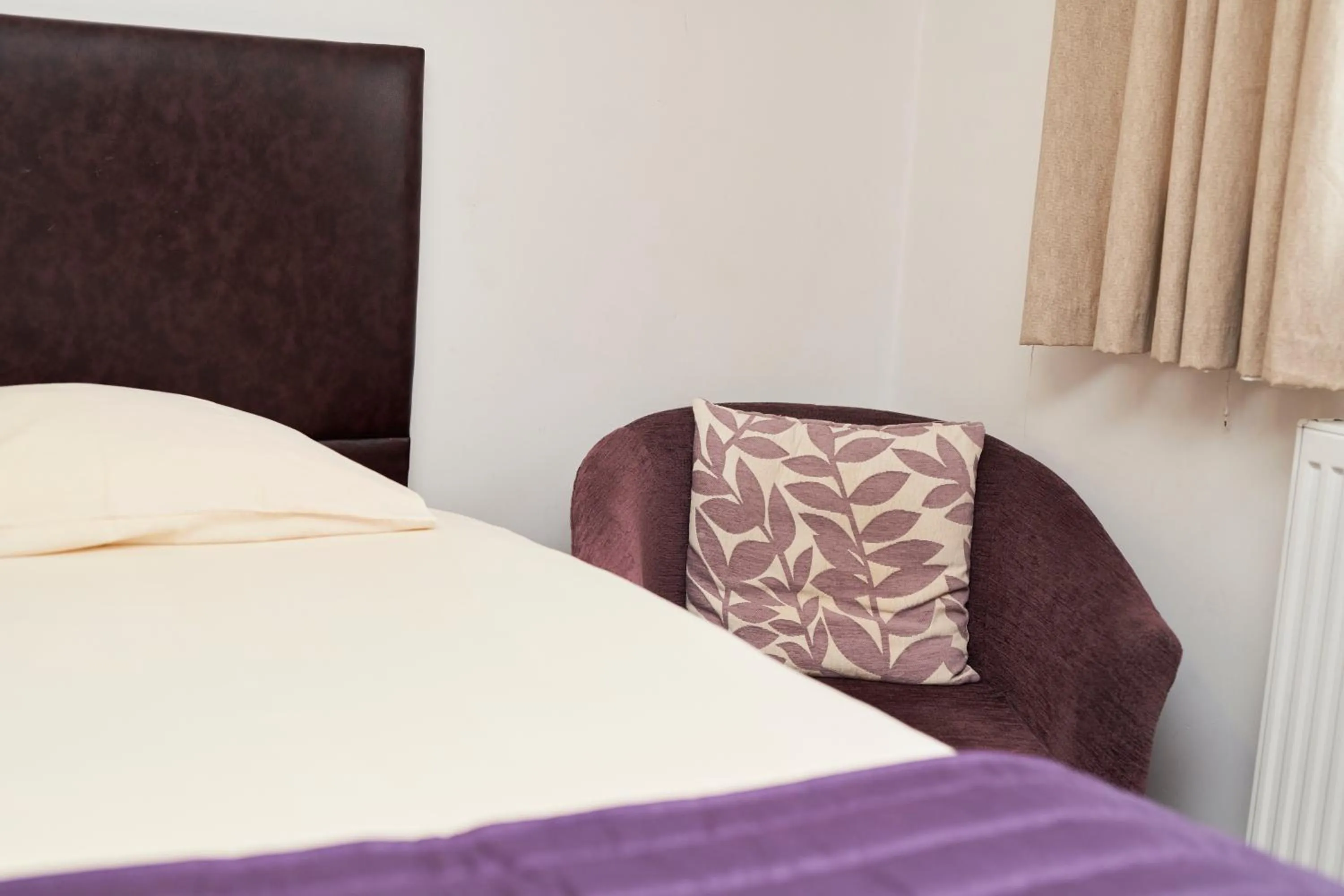 Bed in The New Inn Hotel