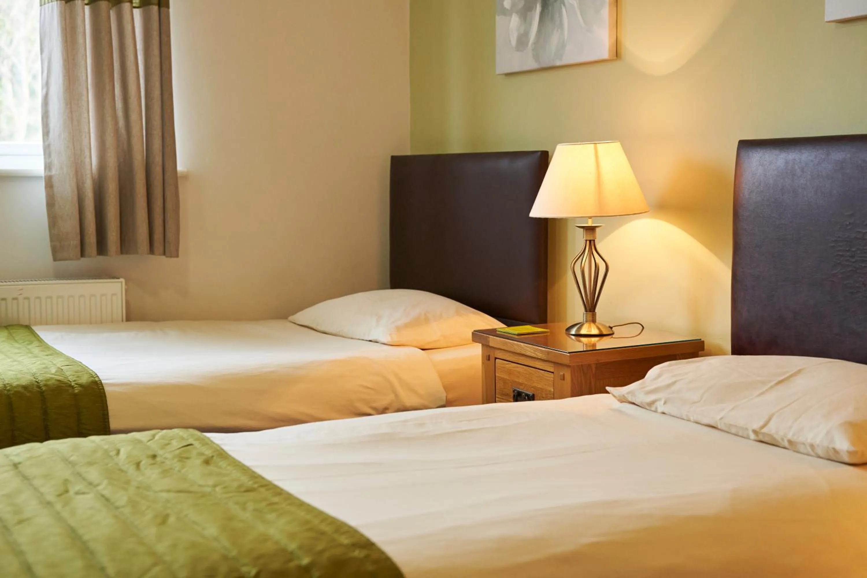 Bed in The New Inn Hotel