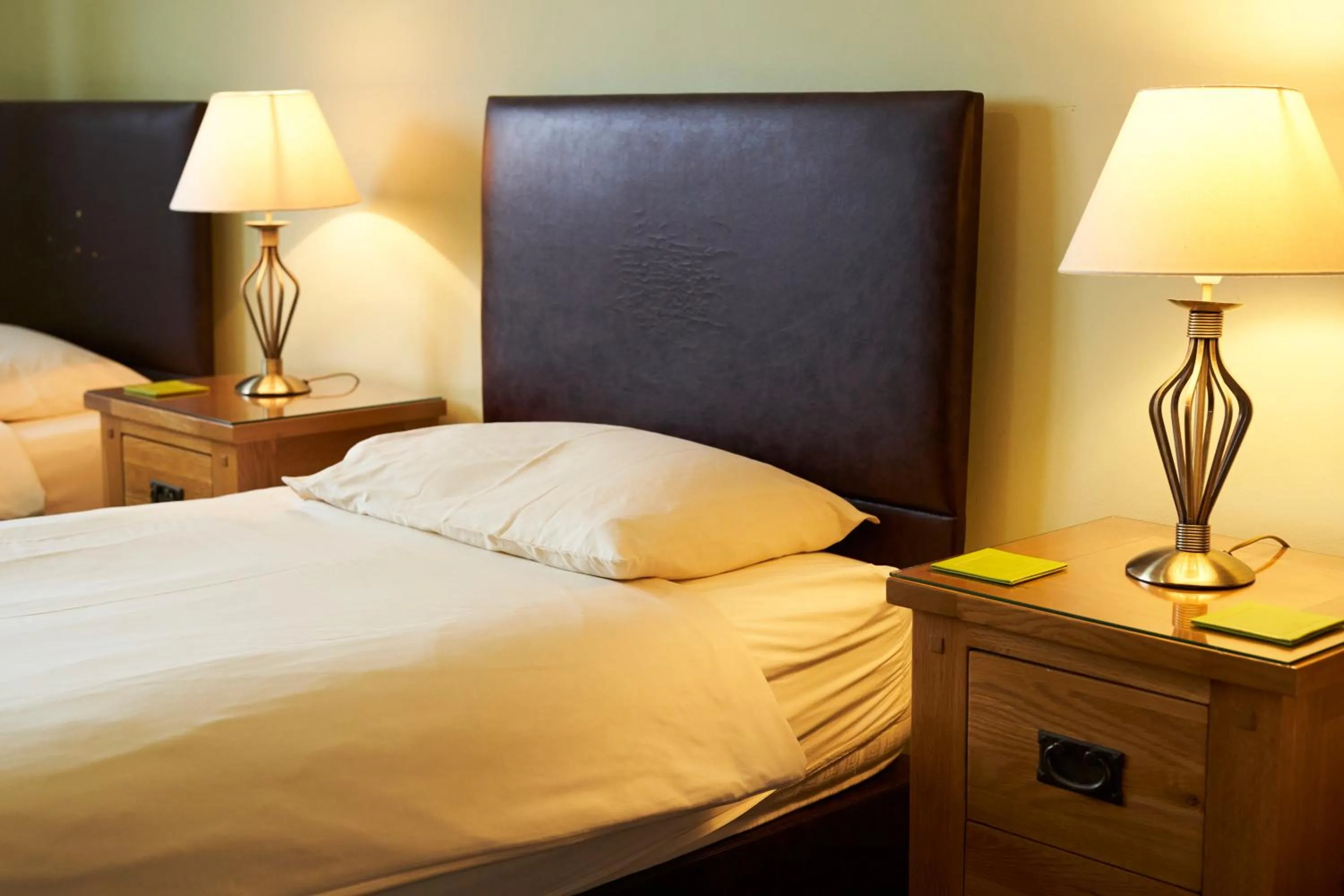 Bed in The New Inn Hotel