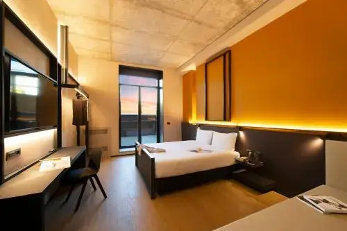 Triple Room with Patio in Breda Suites Hotel Milano Triple Room with Patio in Breda Suites Hotel Milano