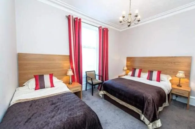 Bed in Belvedere Guest House