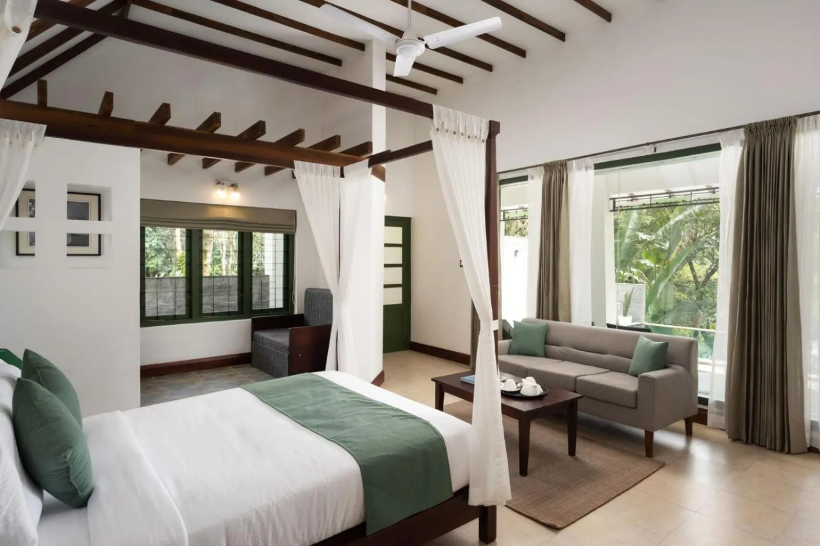 Photo of the whole room, Bed in Reen Resorts Aanavilasam Plantation Thekkady