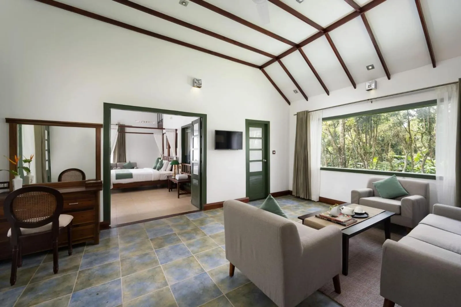 Living room, Bed in Reen Resorts Aanavilasam Plantation Thekkady