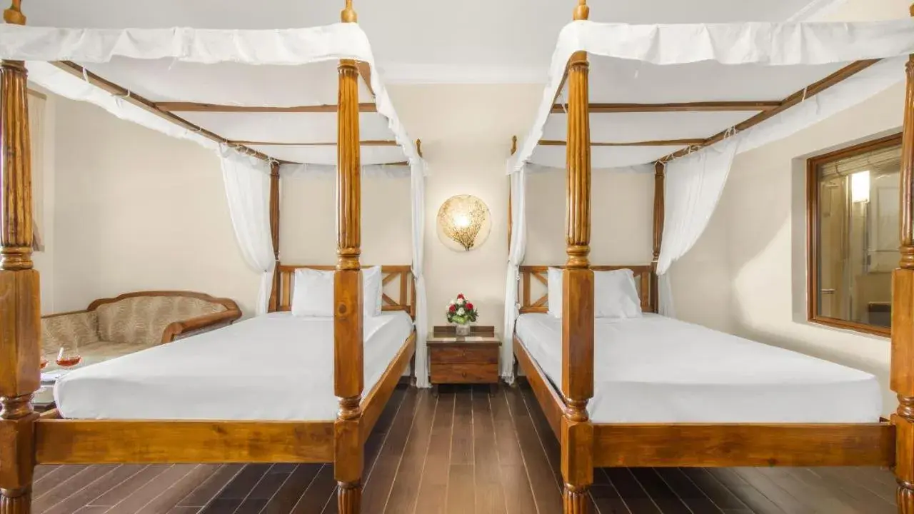 Bed in Domina Coral Bay Resort, Diving , Spa & Casino Bed in Domina Coral Bay Resort, Diving , Spa & Casino