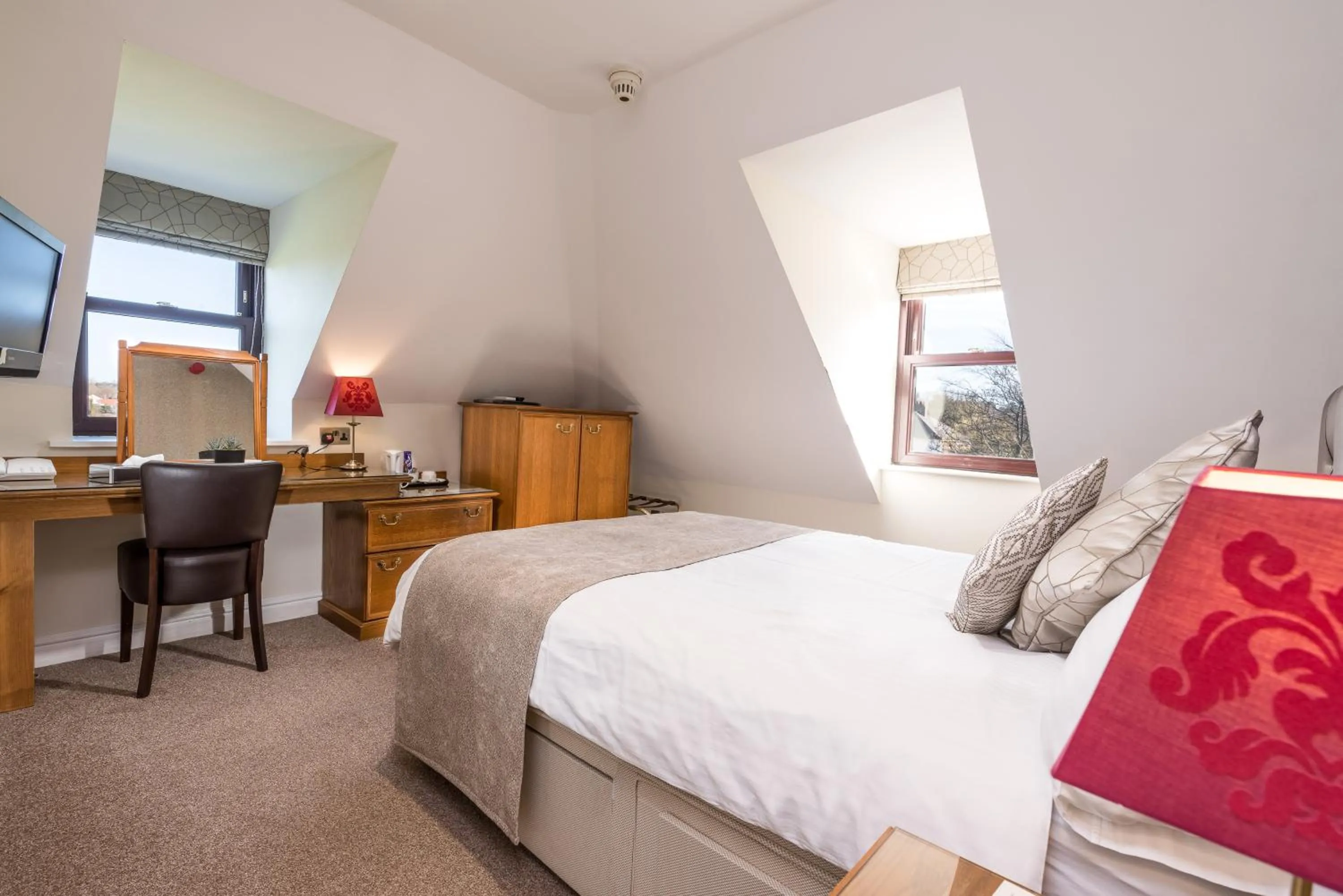 Bed in Le Friquet Hotel