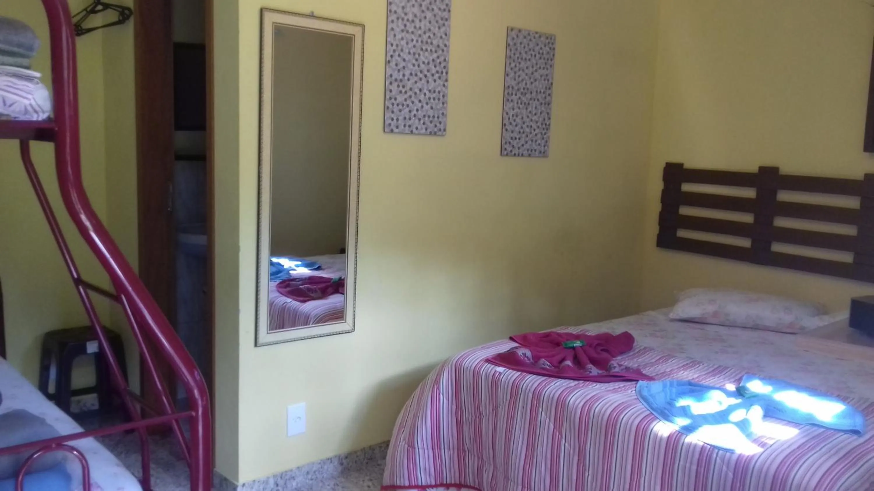 Bed in Sítio e Pousada Recanto Dos Ipês