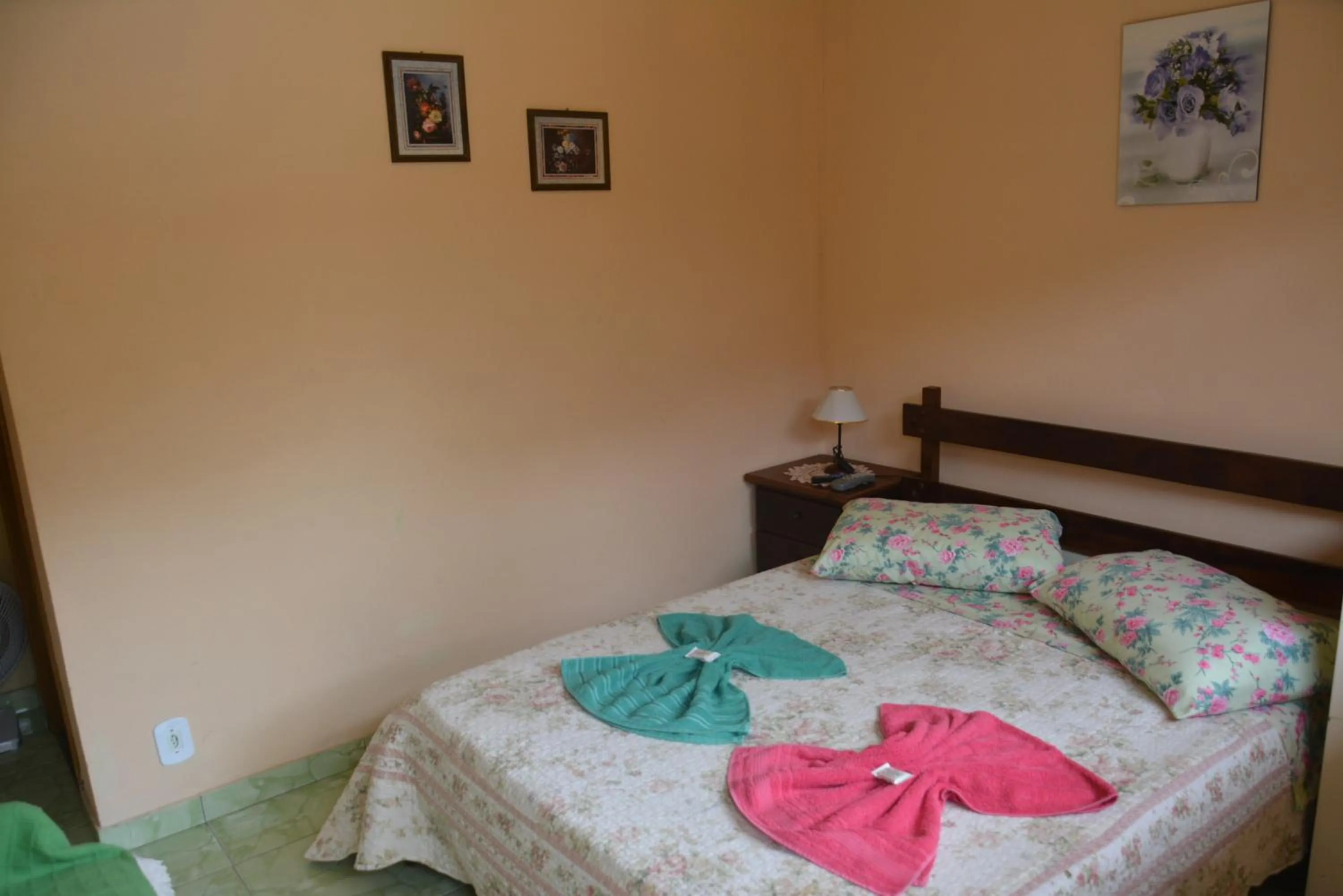 Bed in Sítio e Pousada Recanto Dos Ipês