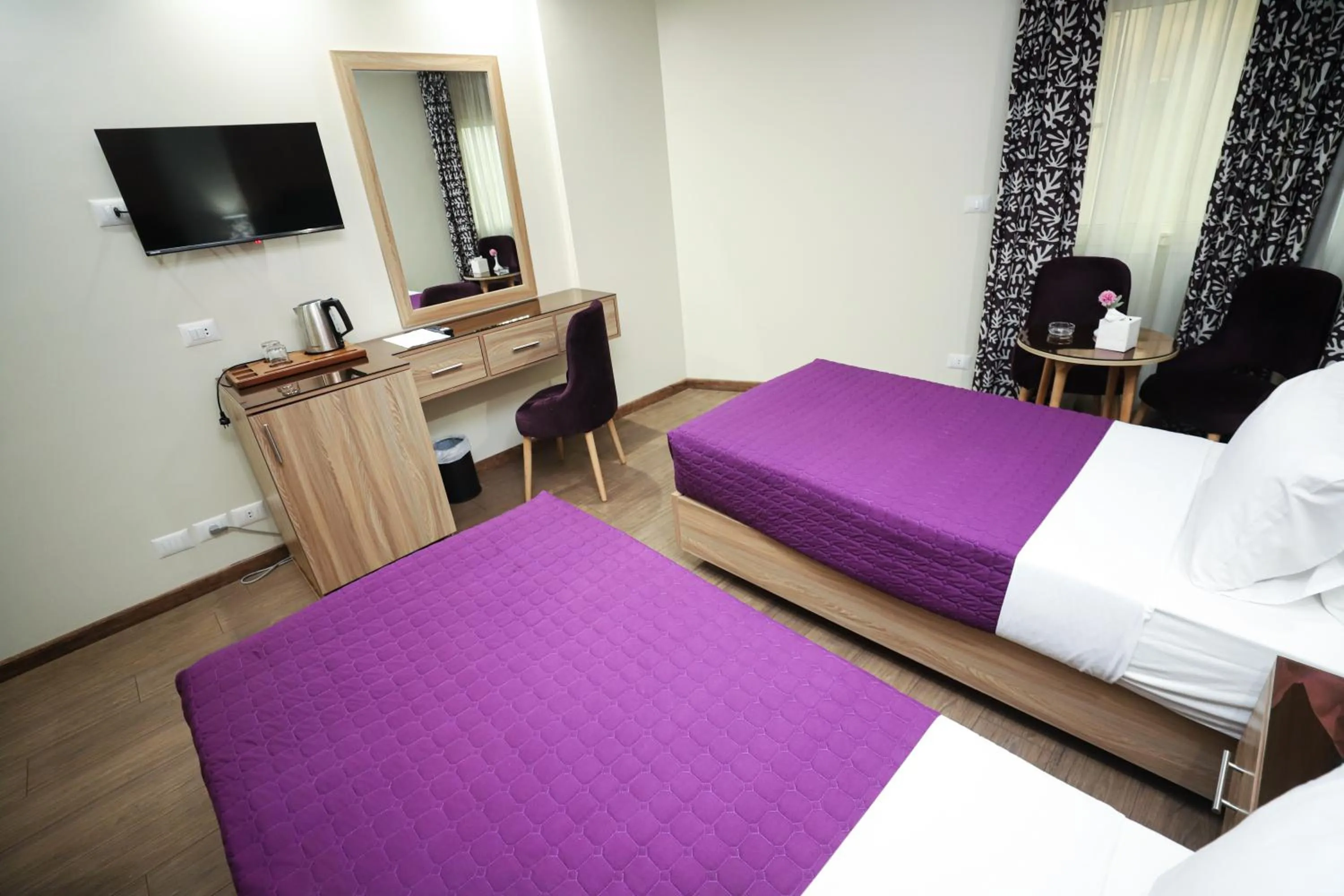 Bed in Gawharet Al Ahram Hotel