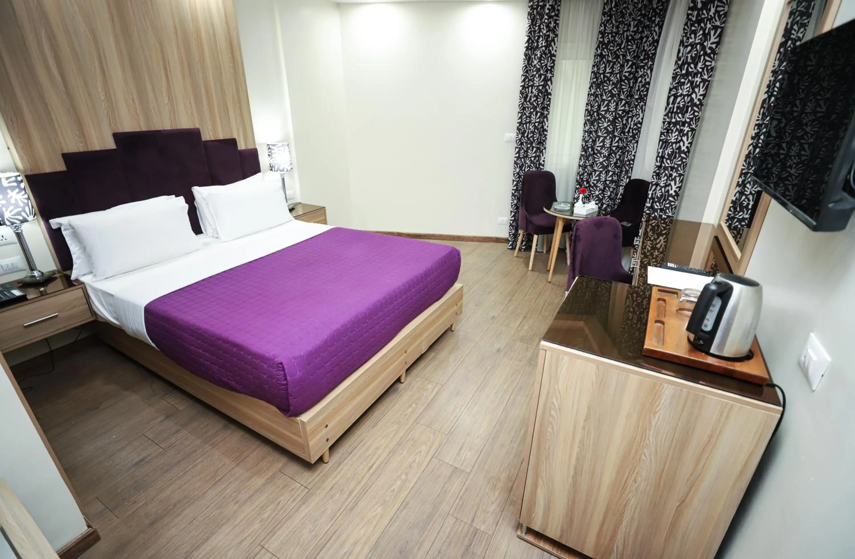 Photo of the whole room, Bed in Gawharet Al Ahram Hotel