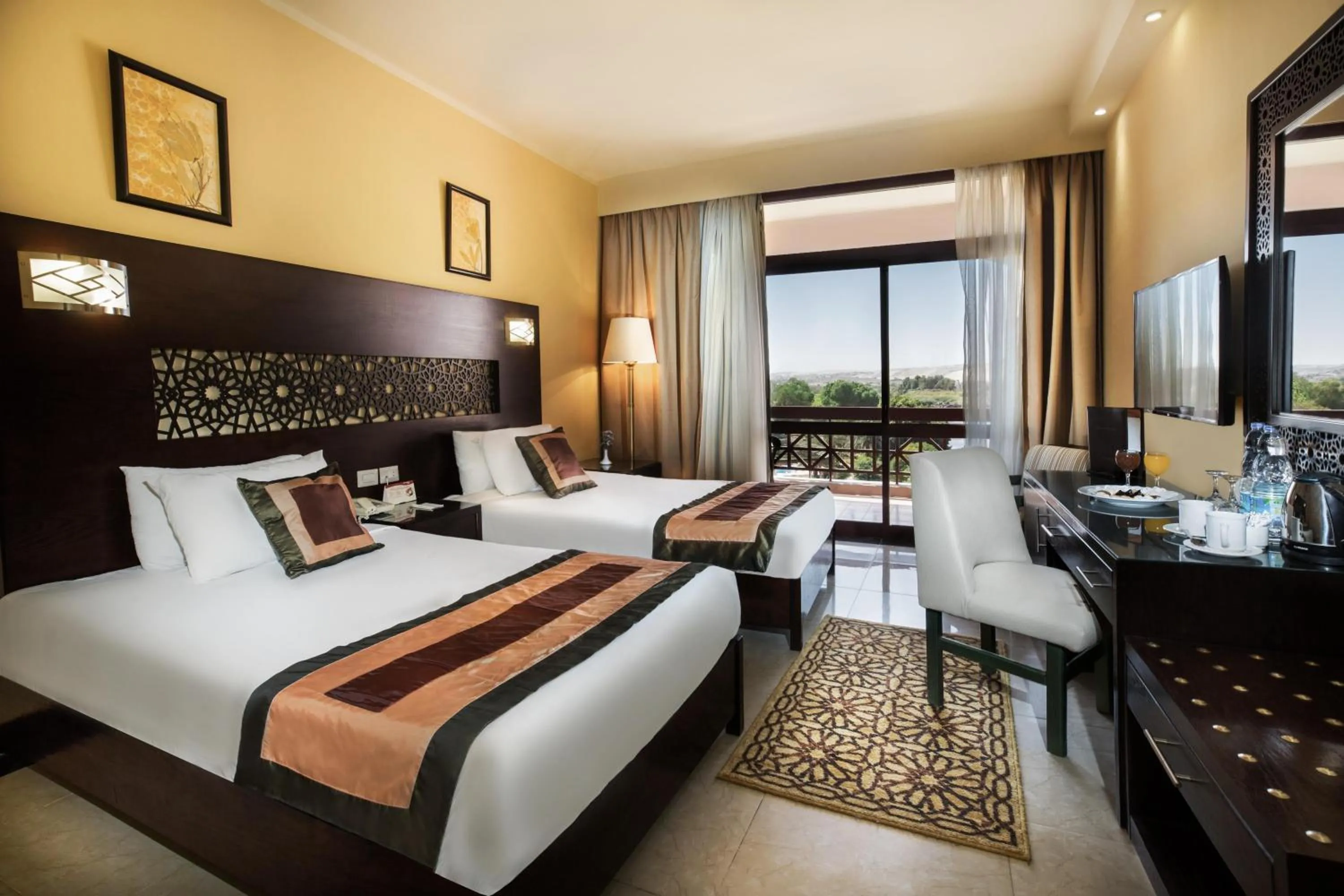 Photo of the whole room, Bed in Pyramisa Island Hotel Aswan