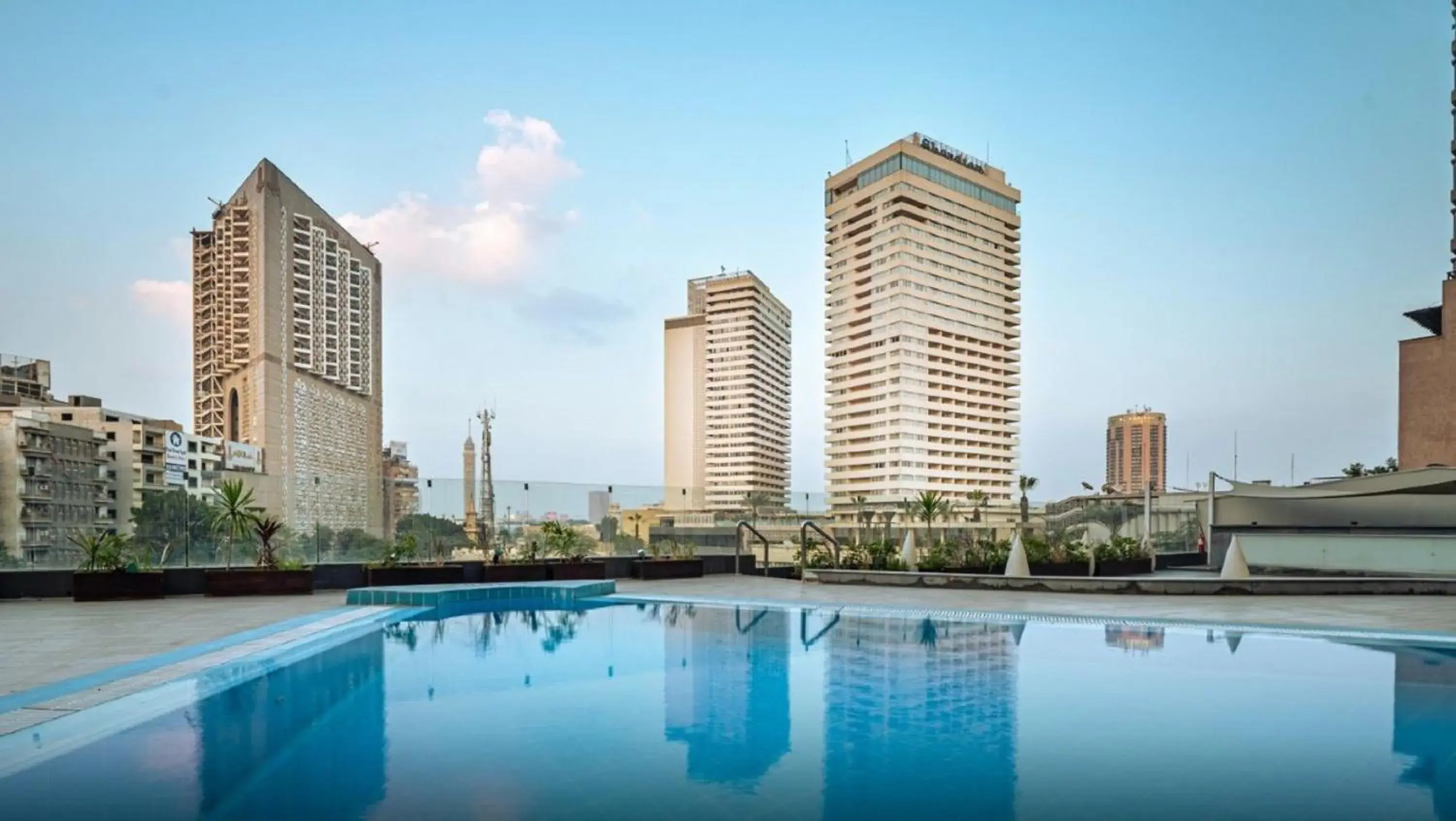 Swimming pool in Pyramisa Suites Hotel Cairo Swimming pool in Pyramisa Suites Hotel Cairo