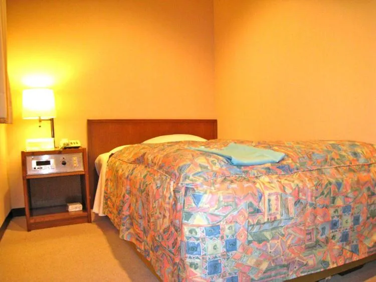 Bed in Hotel Takamatsu Hills