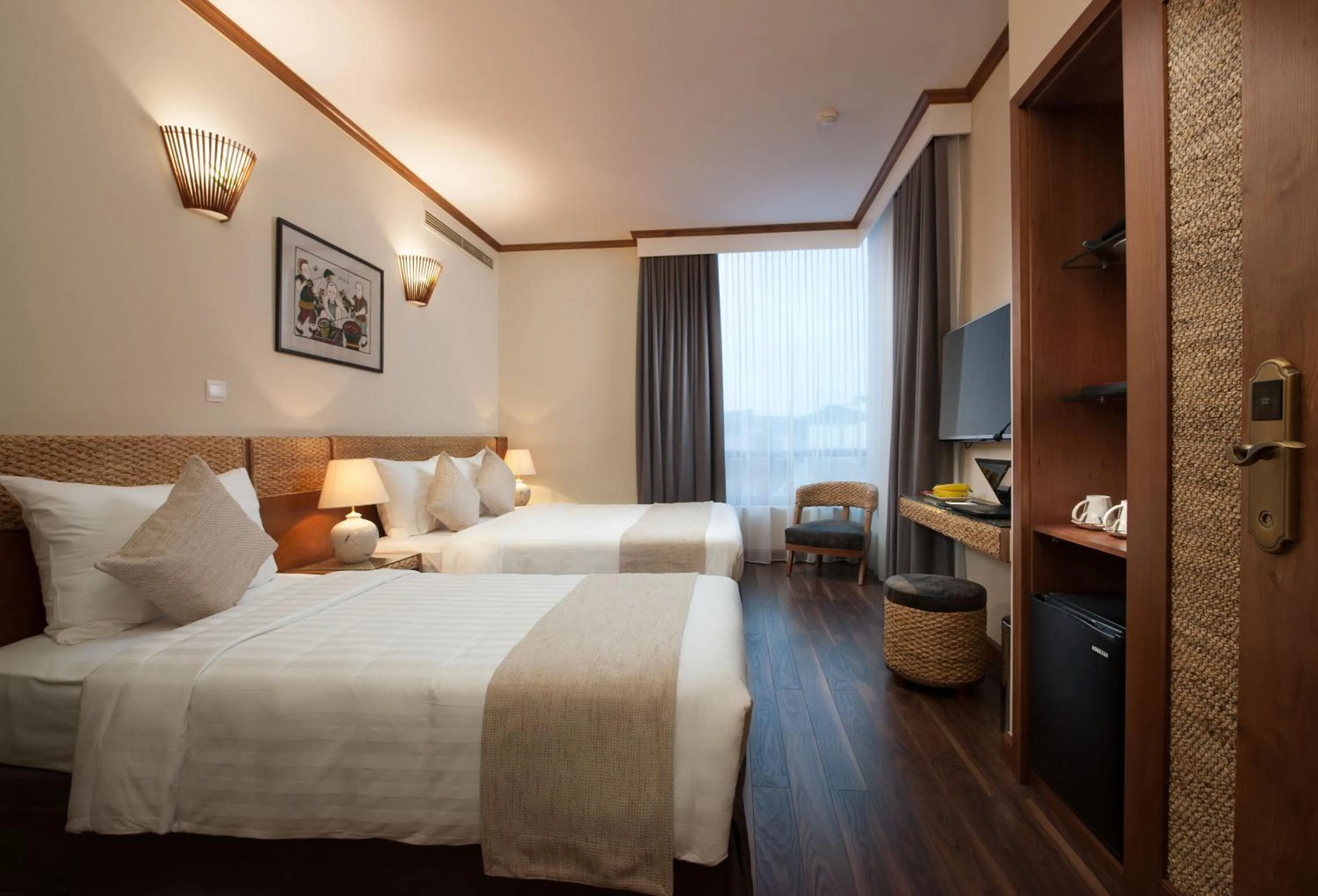 Bed in MK Premier Boutique Hotel