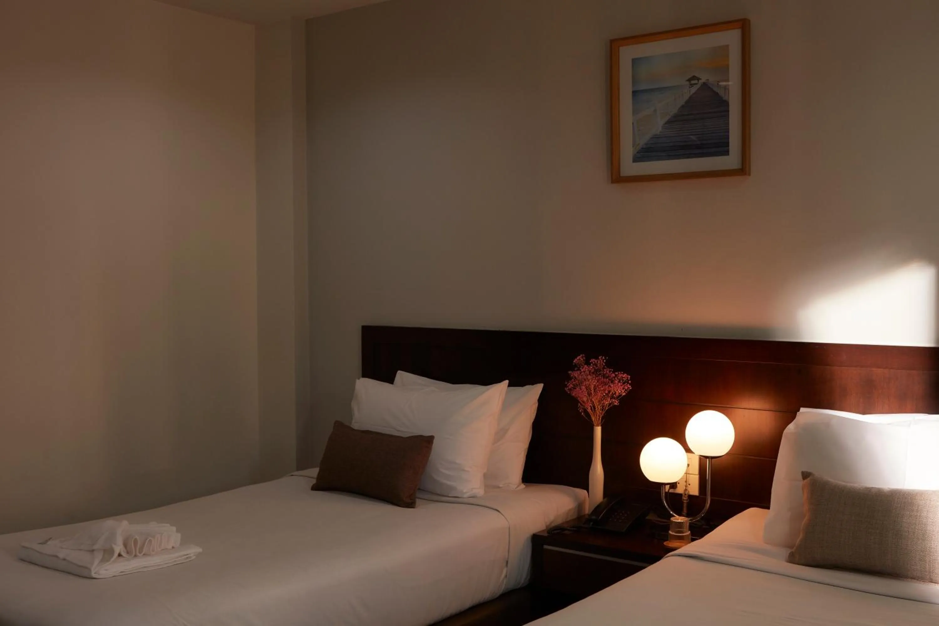 Bed in Rhienchai Place Hotel