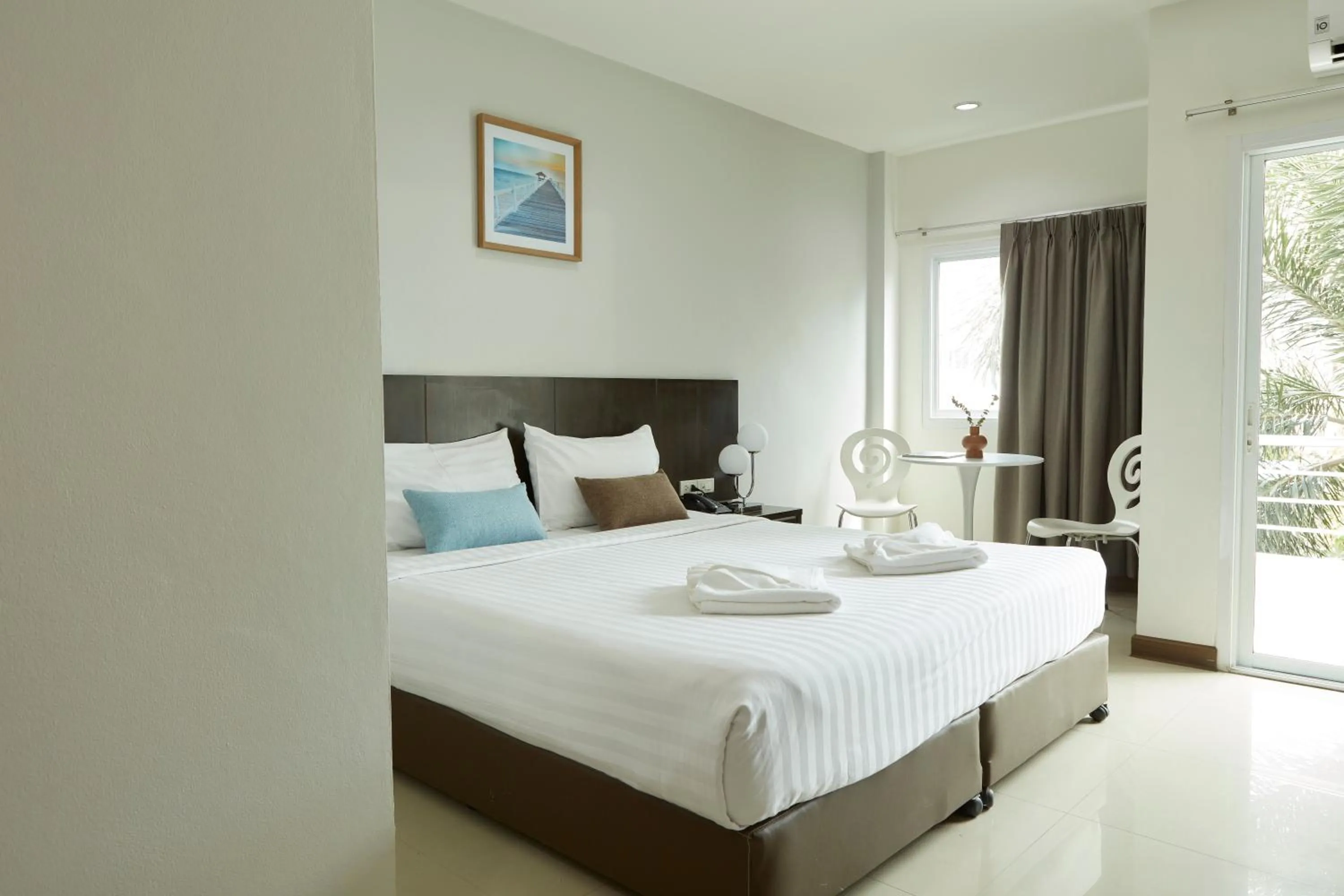 Bed in Rhienchai Place Hotel