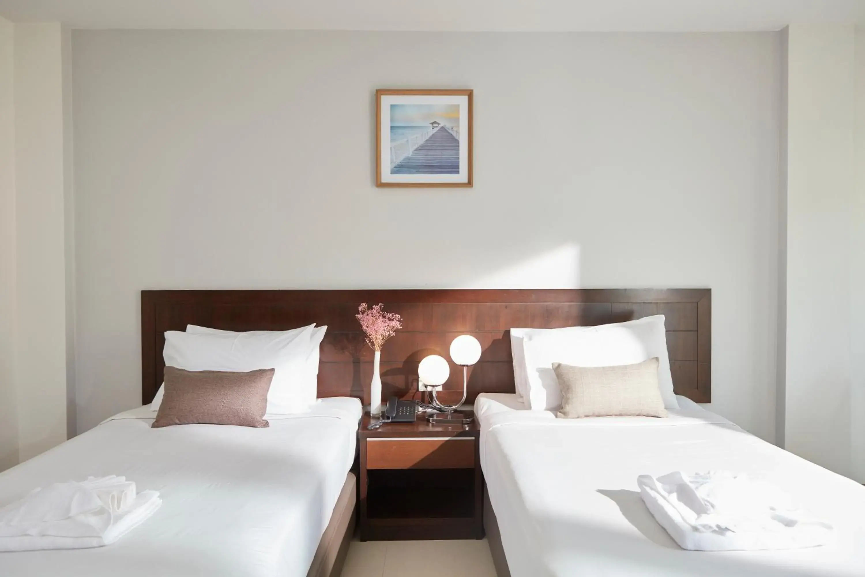 Bed in Rhienchai Place Hotel Bed in Rhienchai Place Hotel