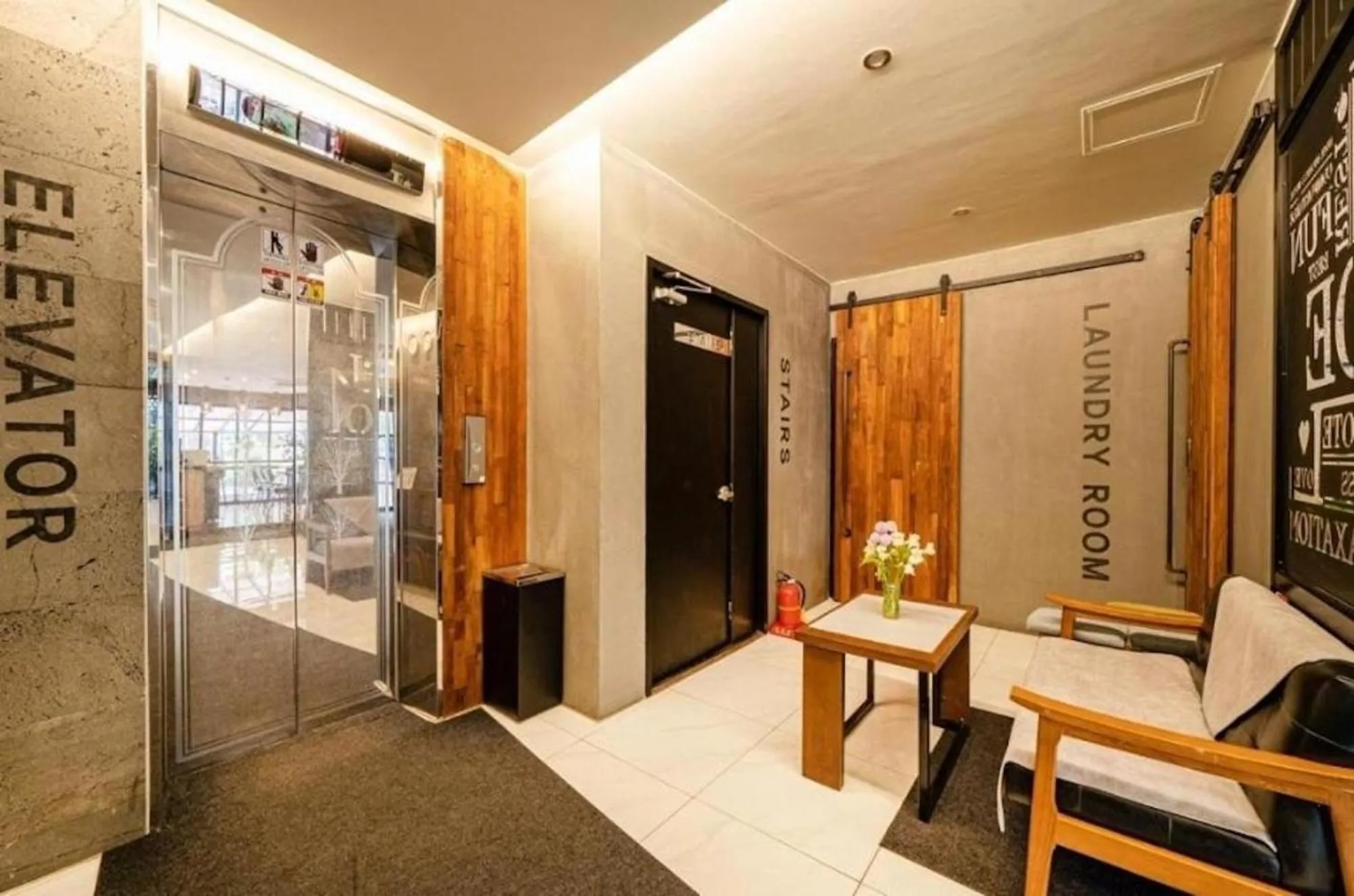 Seating area in Noel Business Hotel