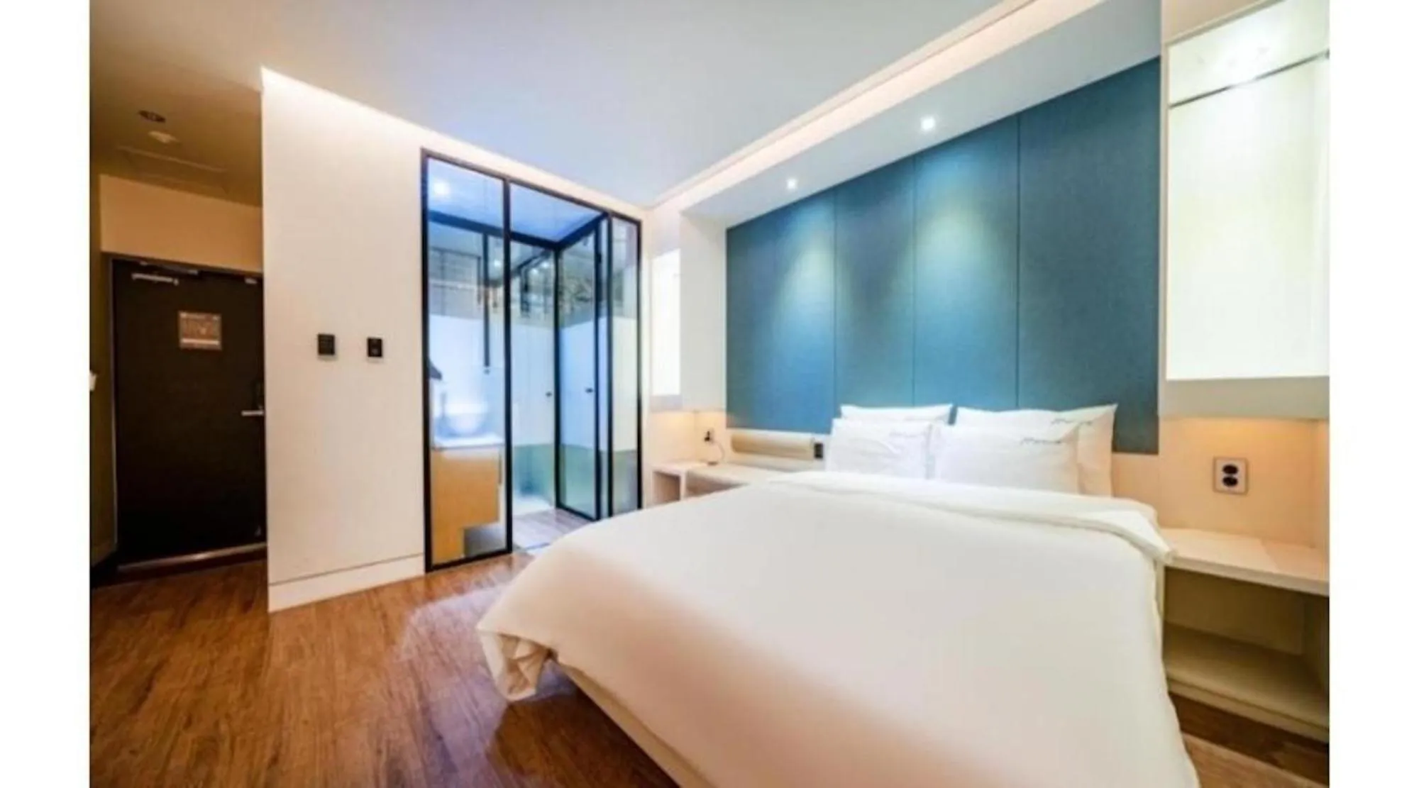 Bed in Noel Business Hotel