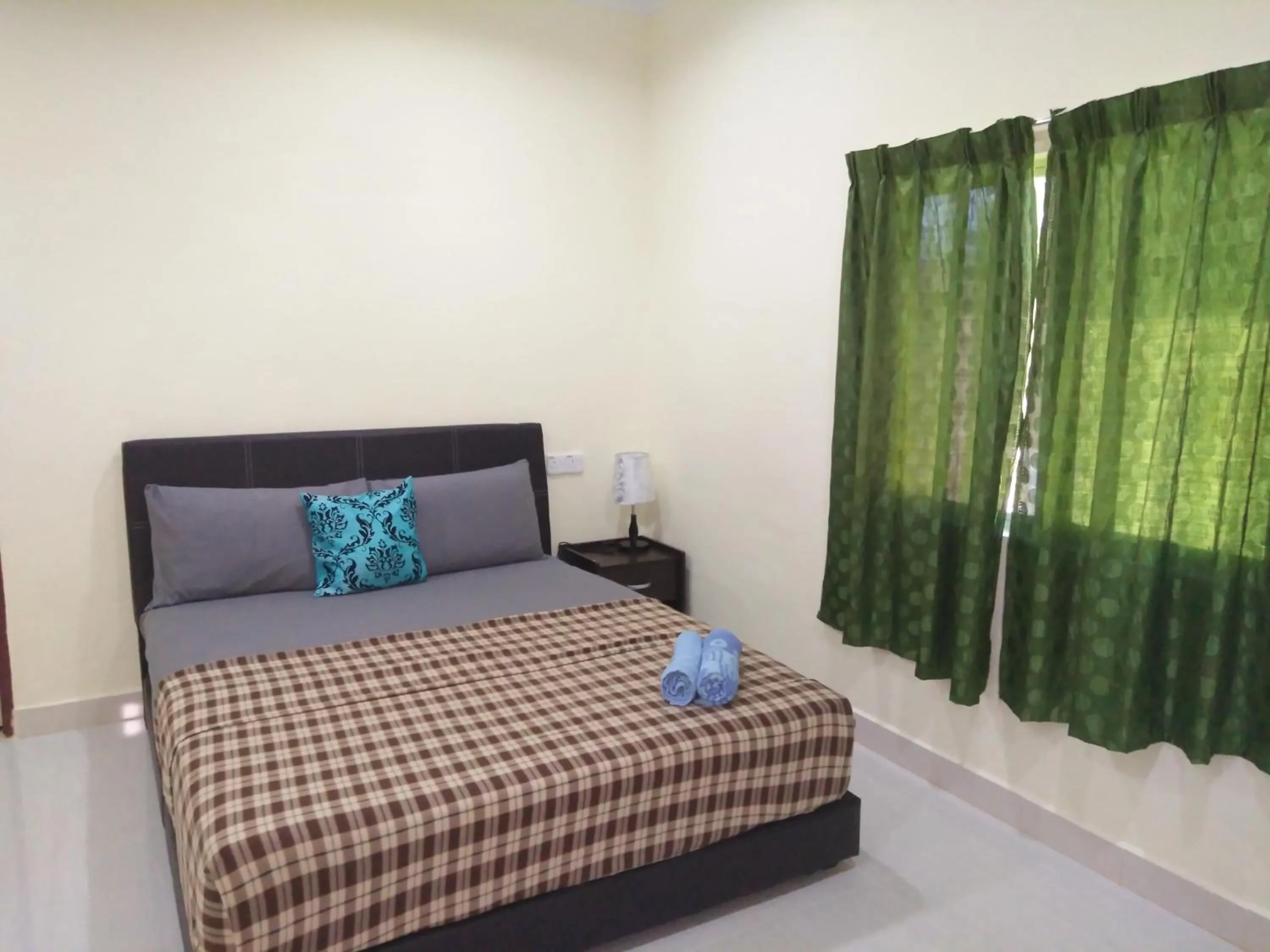 Bed in Motel Aurora Damai