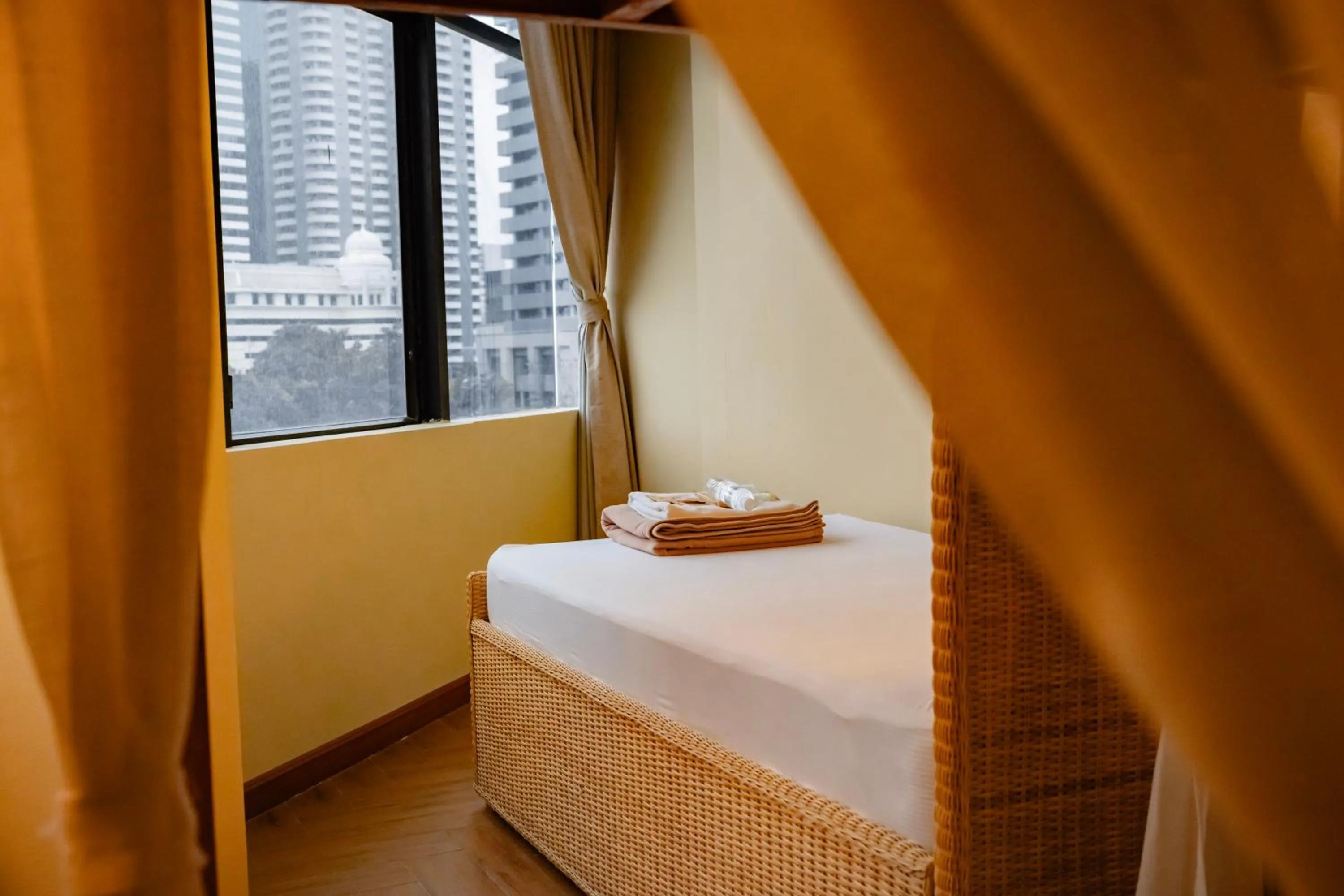 Bed in Metro Pratunam Boutique Hotel