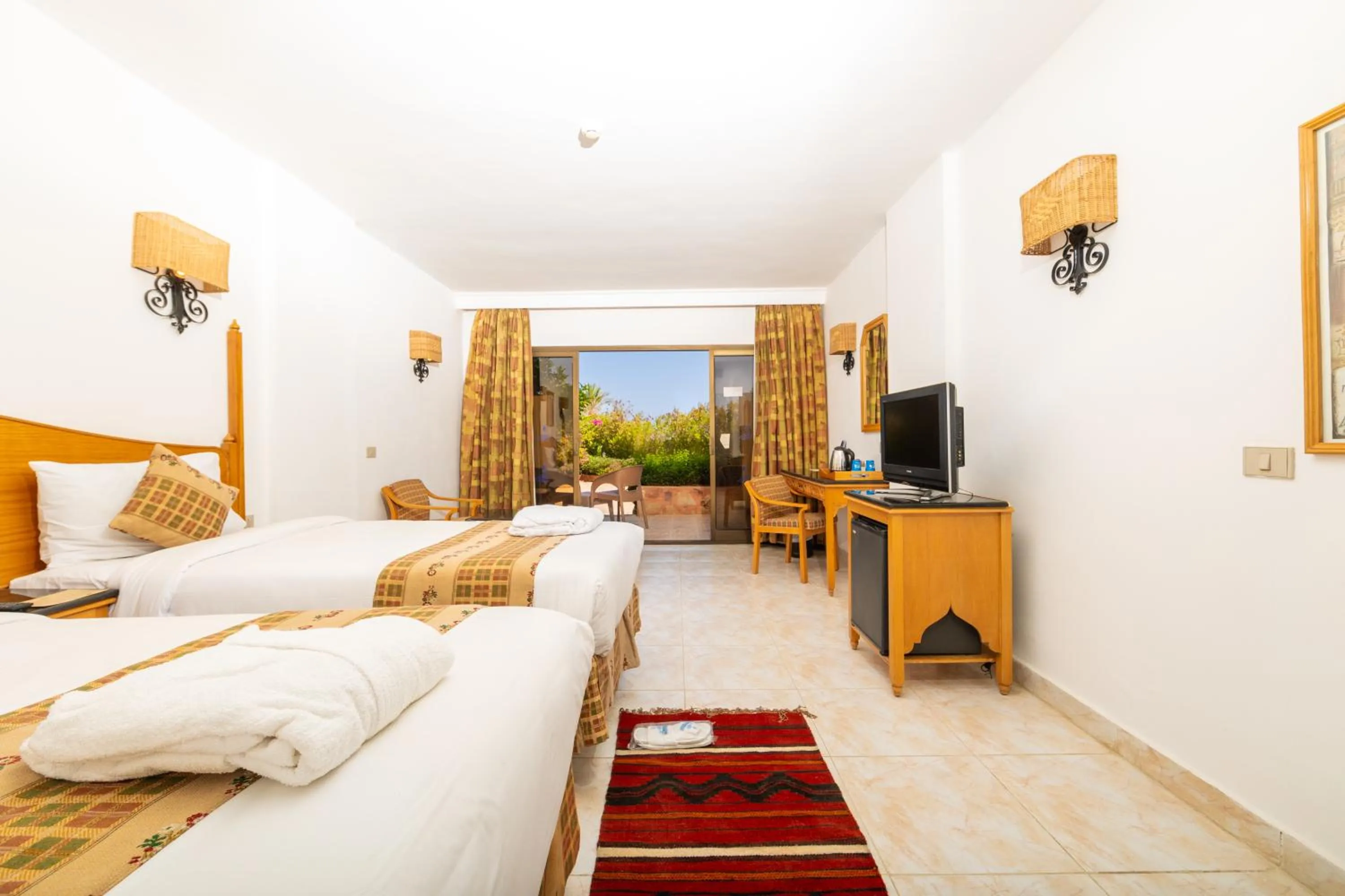 Garden, Bed in Flamenco Beach & Resort Quseir