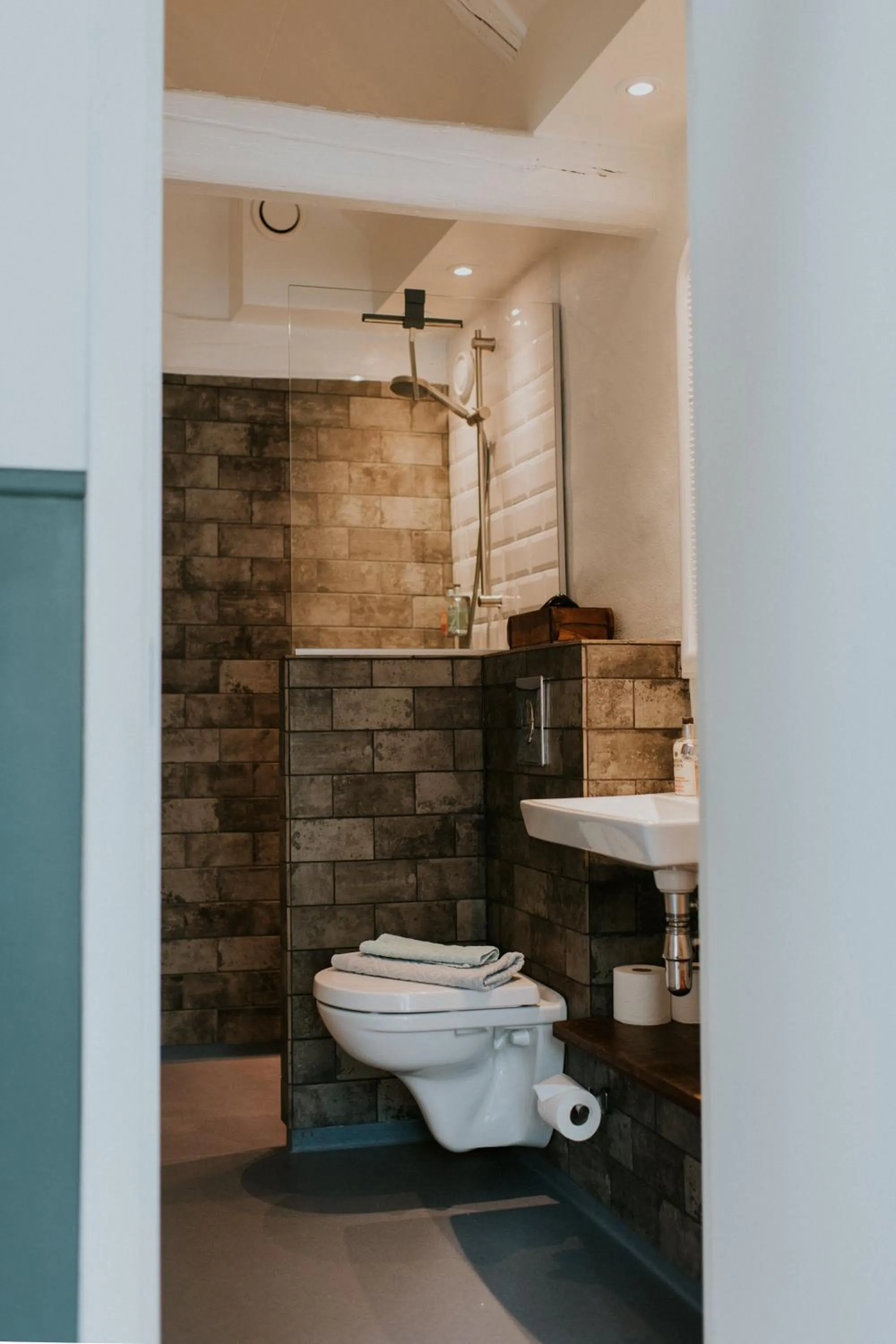 Shower in Hotel På Torvet