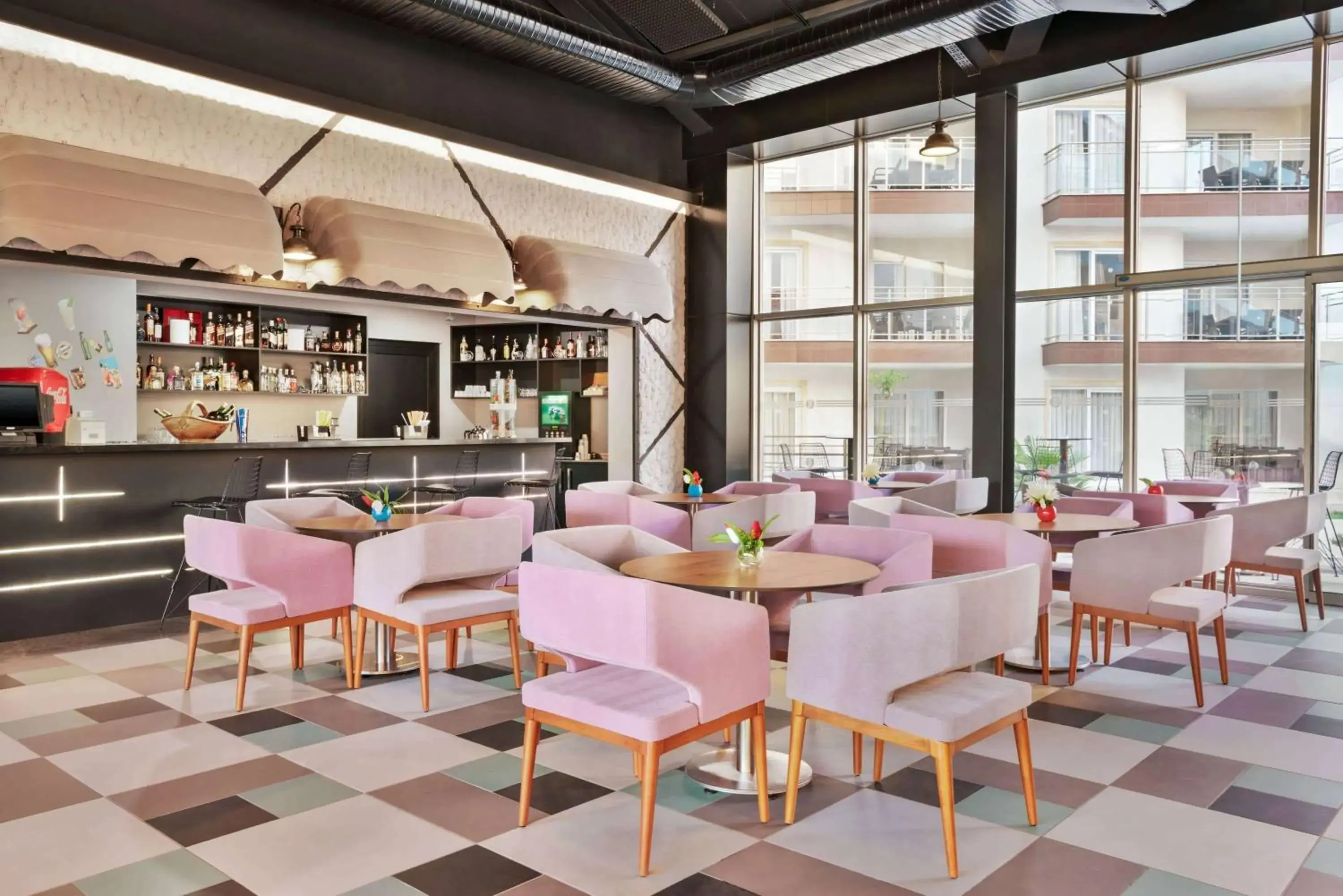 Lounge or bar in Ramada Hotel & Suites by Wyndham Kusadasi Lounge or bar in Ramada Hotel & Suites by Wyndham Kusadasi