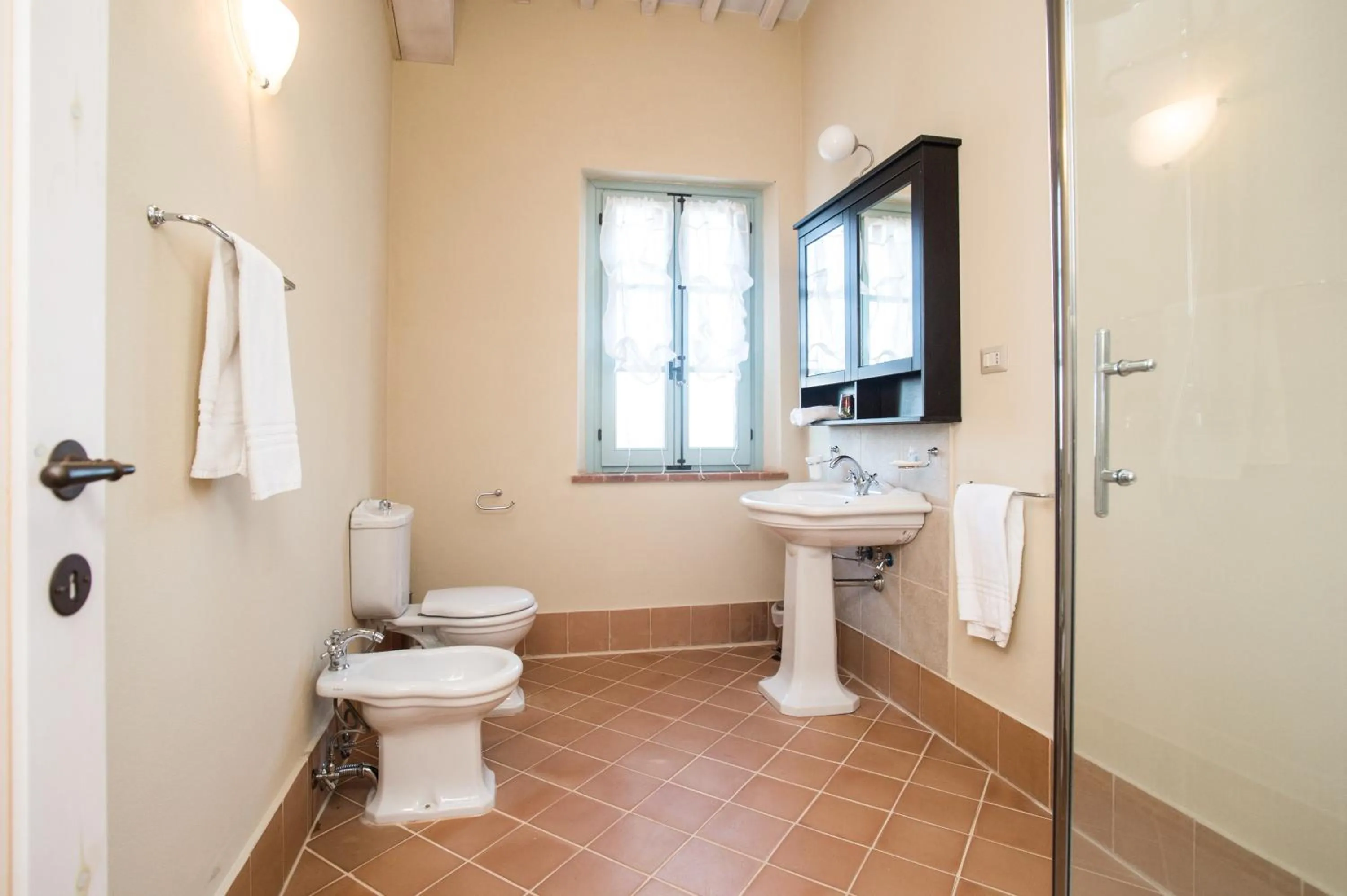Toilet in Cignella Resort
