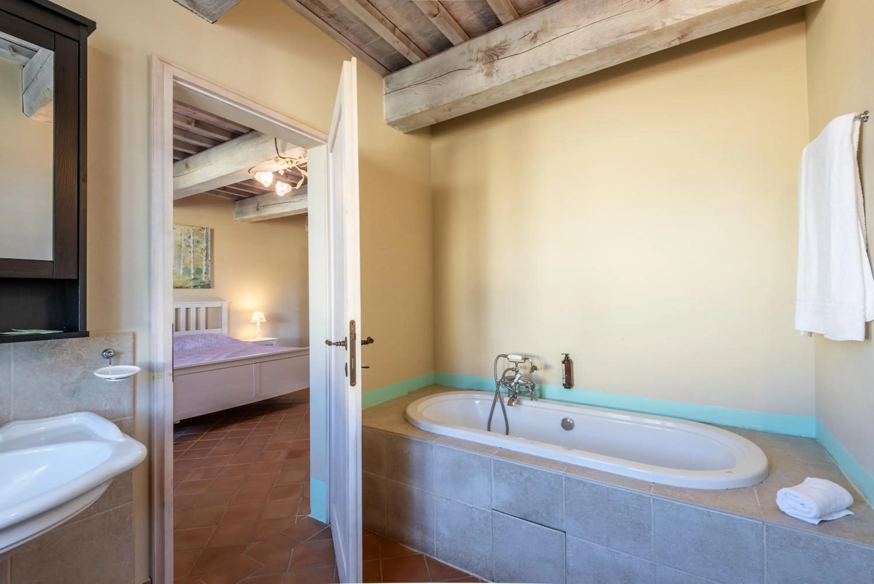 Bathroom, Bed in Cignella Resort