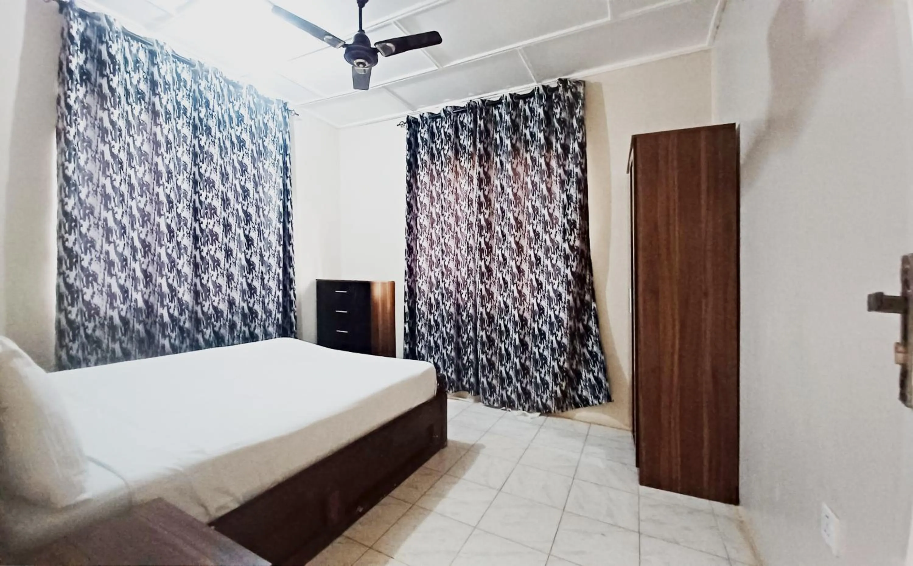 Photo of the whole room, Bed in Harmony house apartments