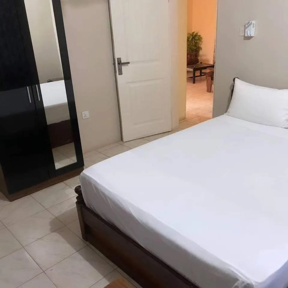 Bedroom, Bed in Harmony house apartments