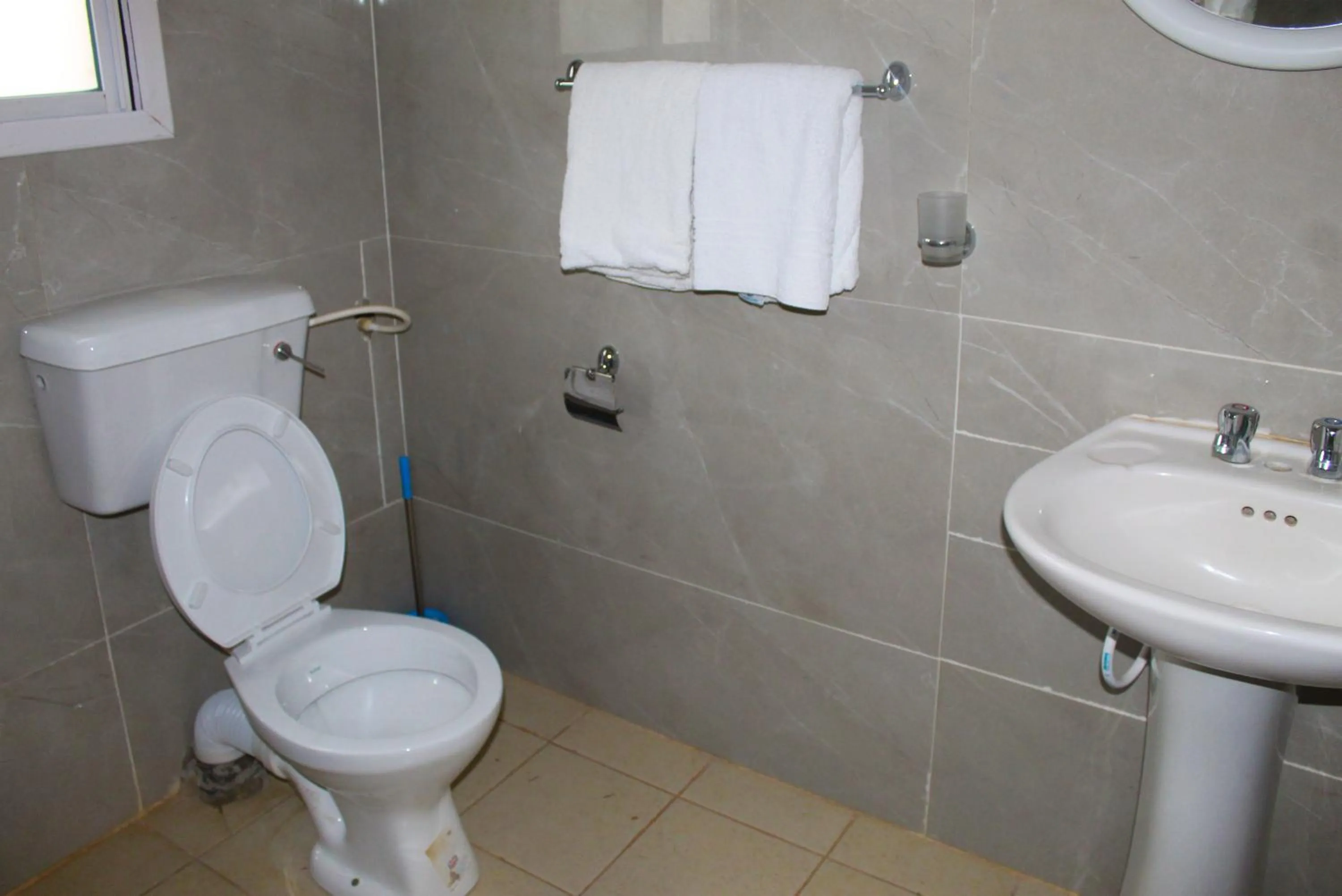 Toilet in Harmony house apartments