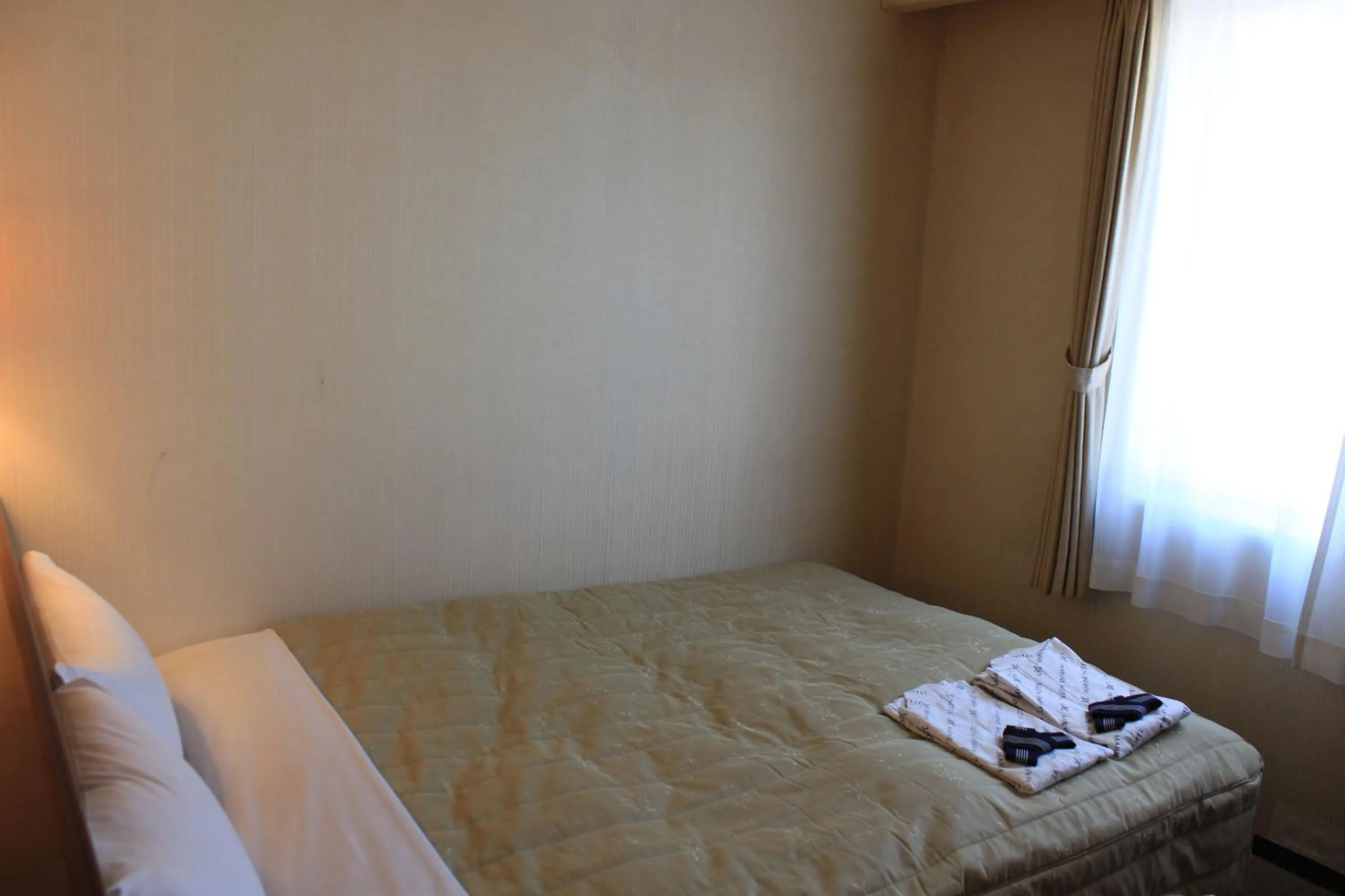 Bed in Ichihara Marine Hotel