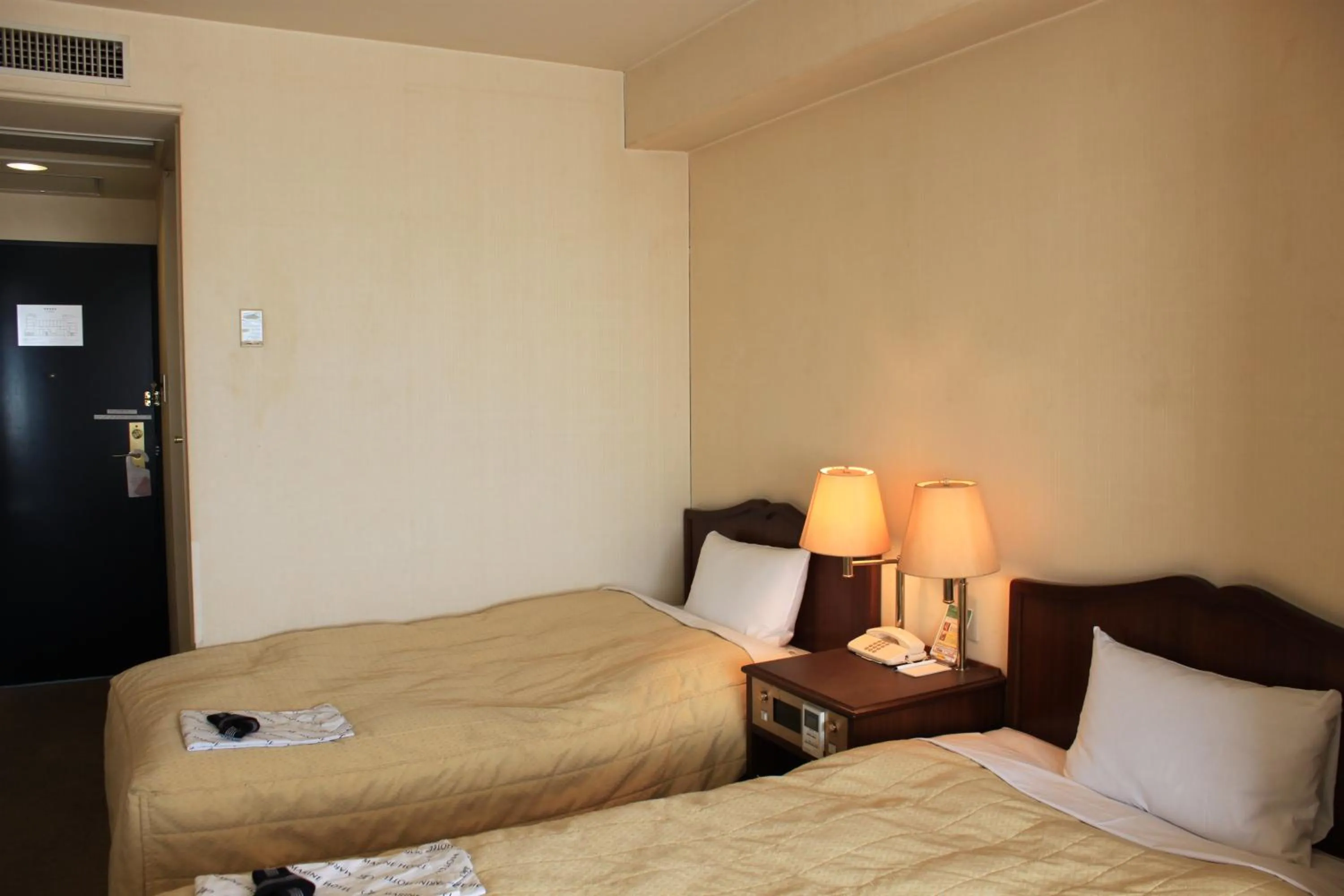 Bed in Ichihara Marine Hotel