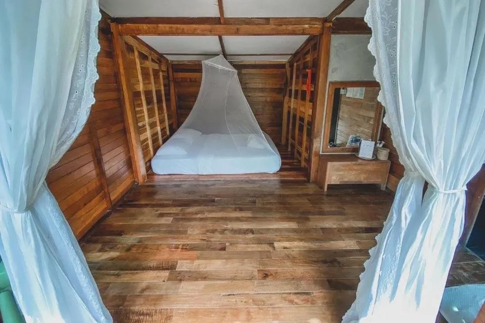 Bed in Jungle Koh Kood Resort