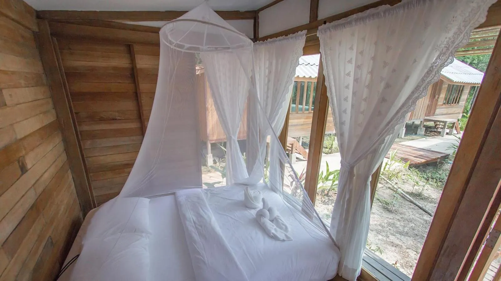 Bed in Jungle Koh Kood Resort