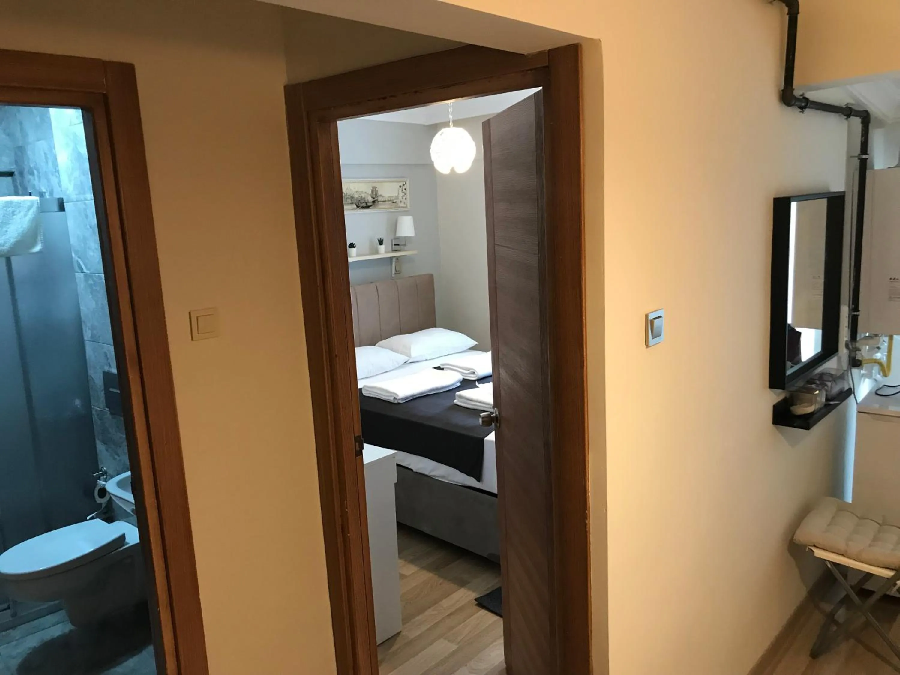 Toilet, Bed in Goji's Apartments