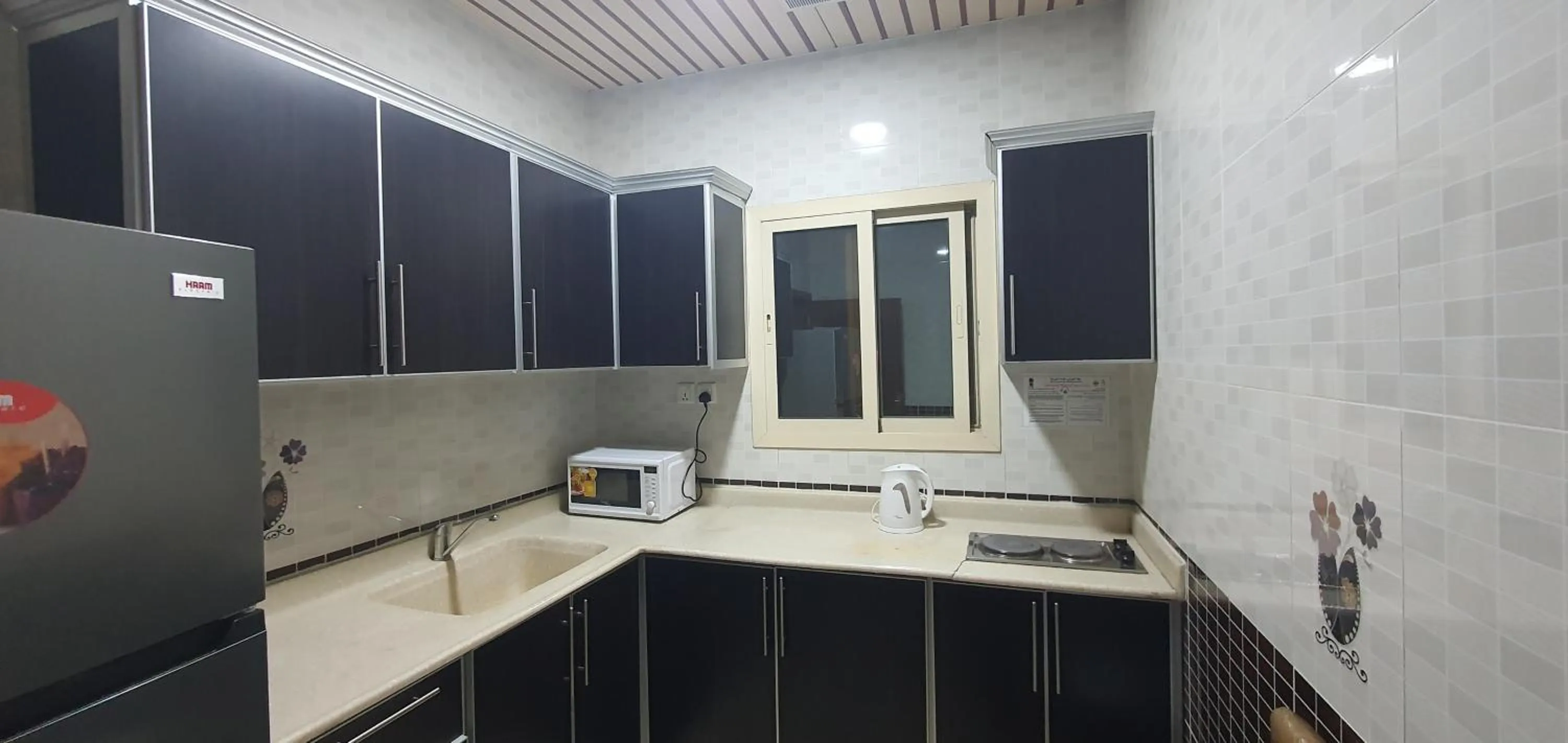 Kitchen or kitchenette in شقق نطوان للشقق المخدومة