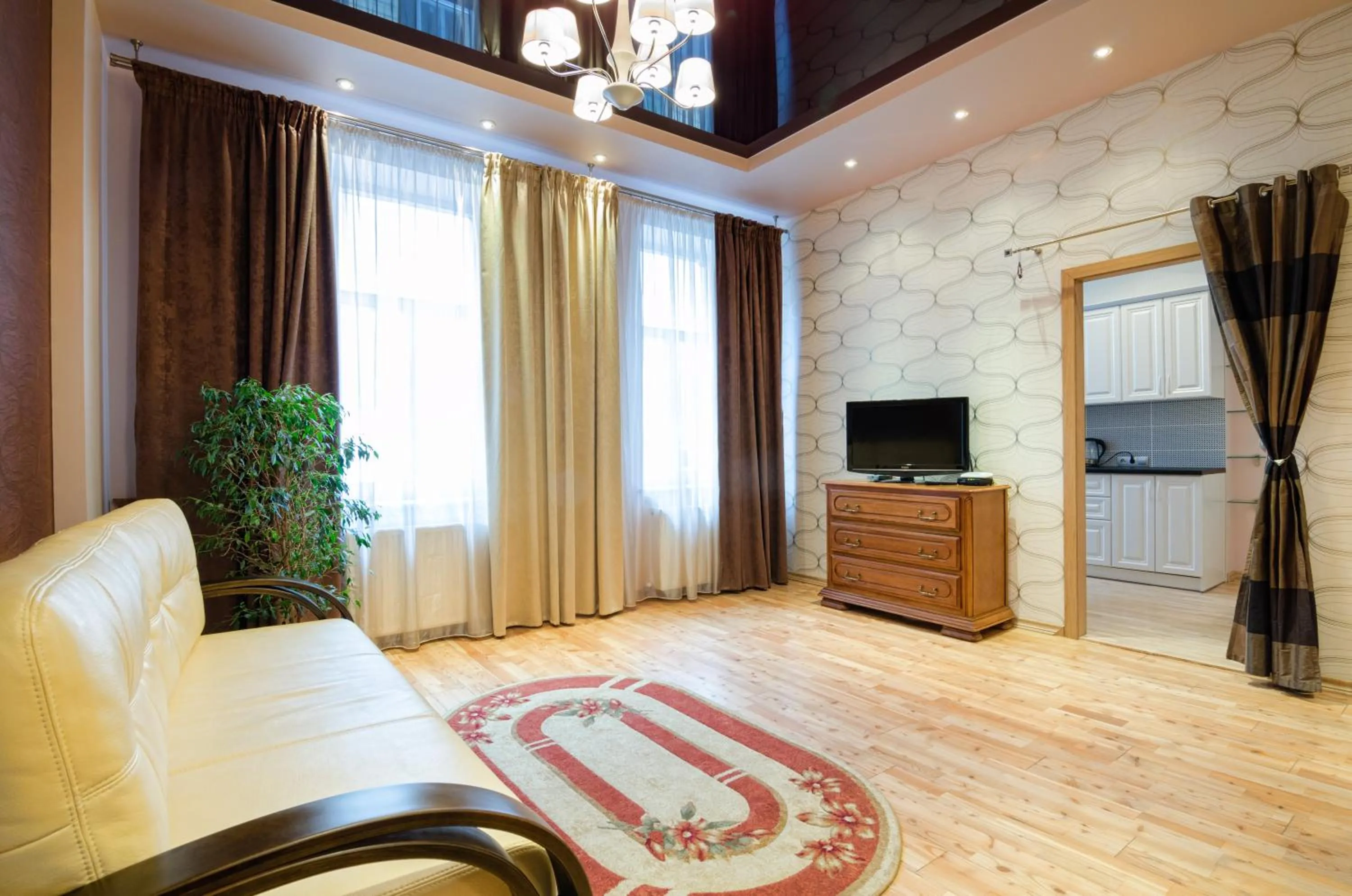 Communal lounge/ TV room in LEOGRAND Apartments on Doroshenka 34