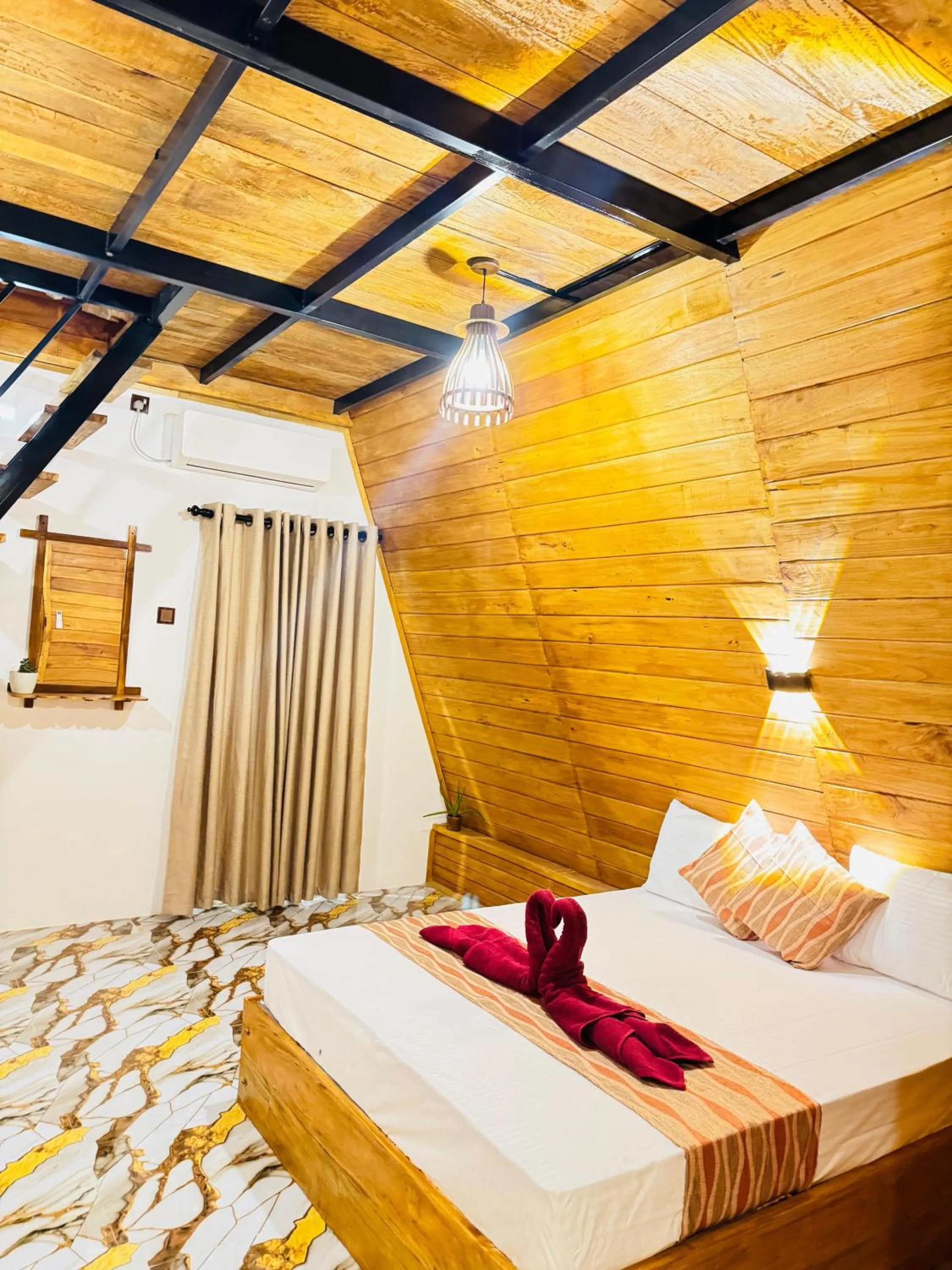 Bed in Sigiri Tarushan Home Stay